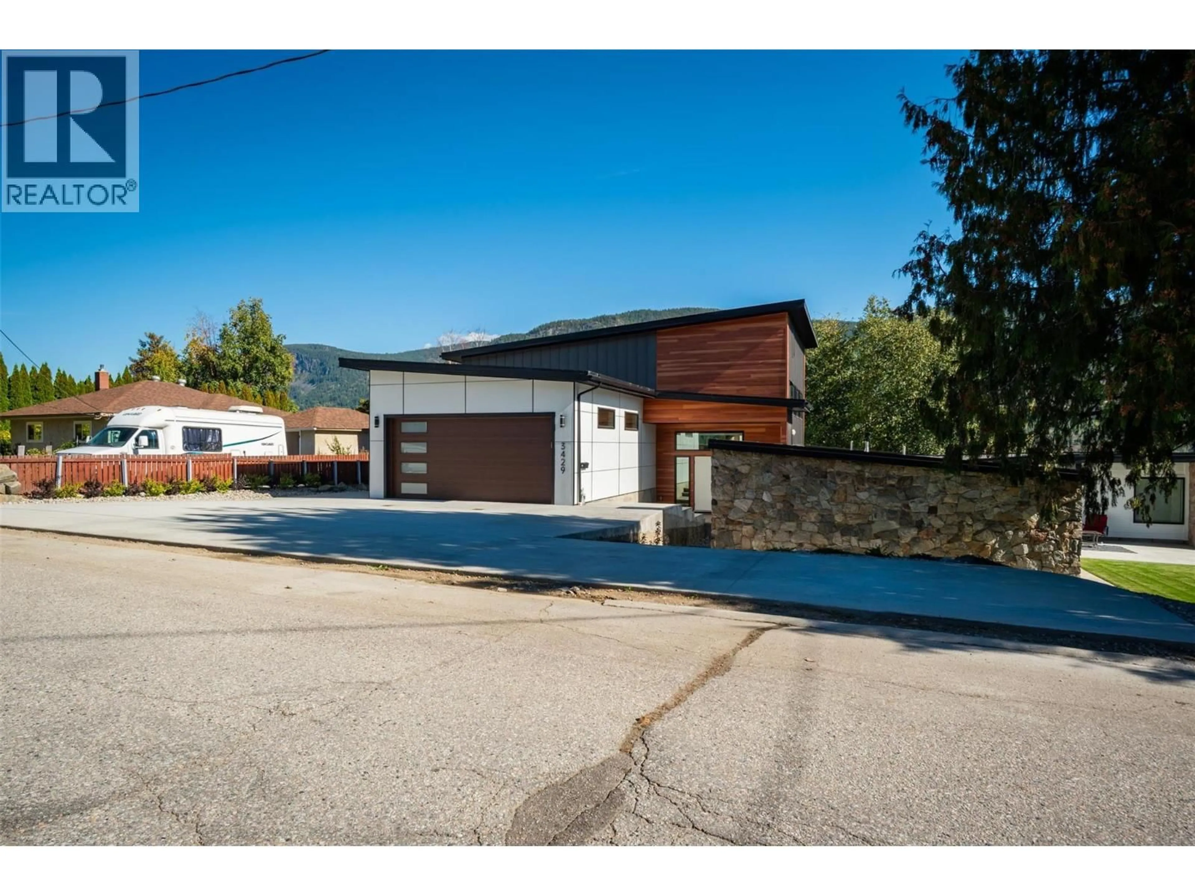 Home with brick exterior material, street for 3429 8TH AVENUE, Castlegar British Columbia V1N4L1