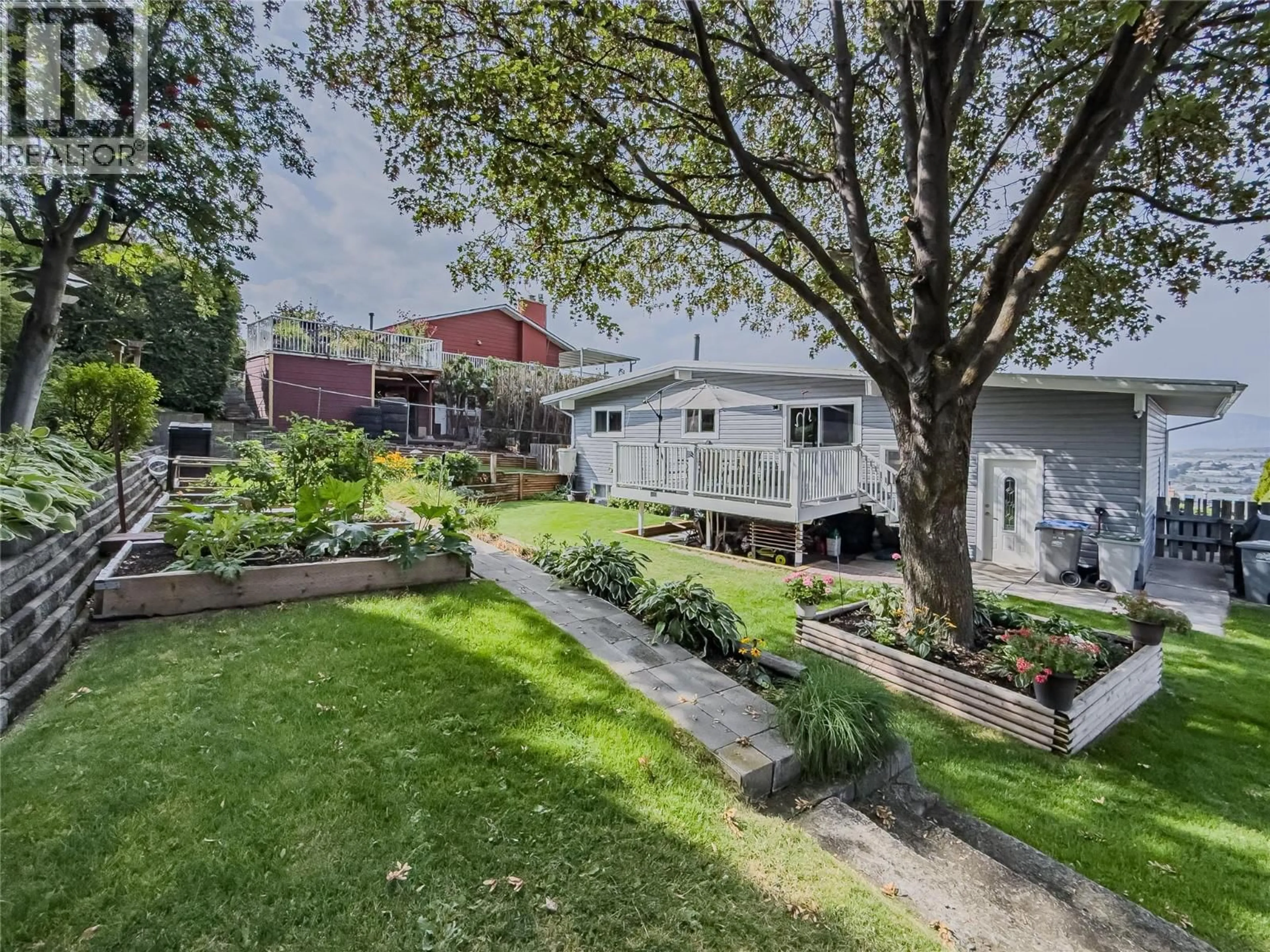 A pic from outside/outdoor area/front of a property/back of a property/a pic from drone, street for 1659 SPRINGHAVEN PLACE, Kamloops British Columbia V2E1C7