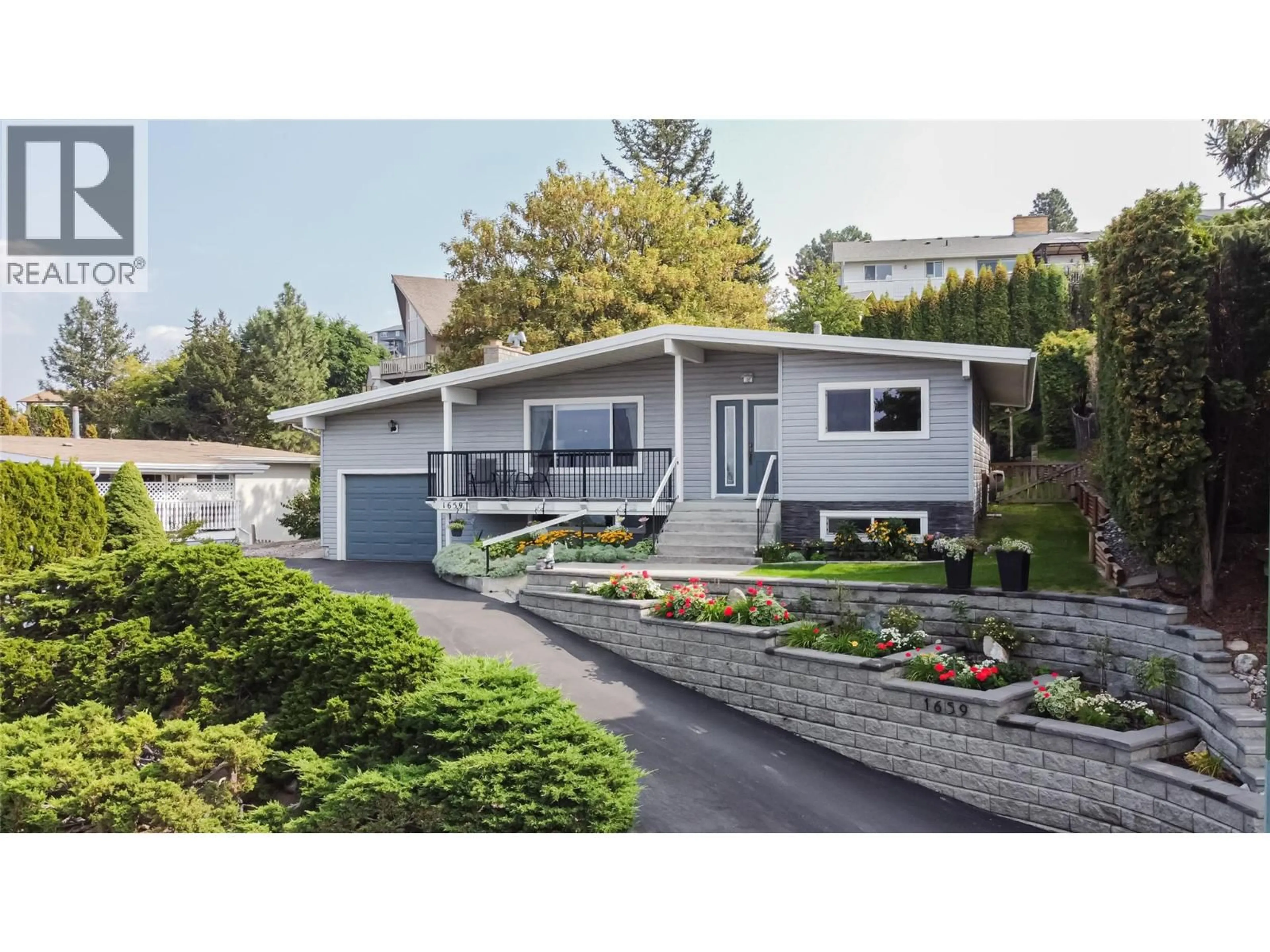 Home with vinyl exterior material, street for 1659 SPRINGHAVEN PLACE, Kamloops British Columbia V2E1C7