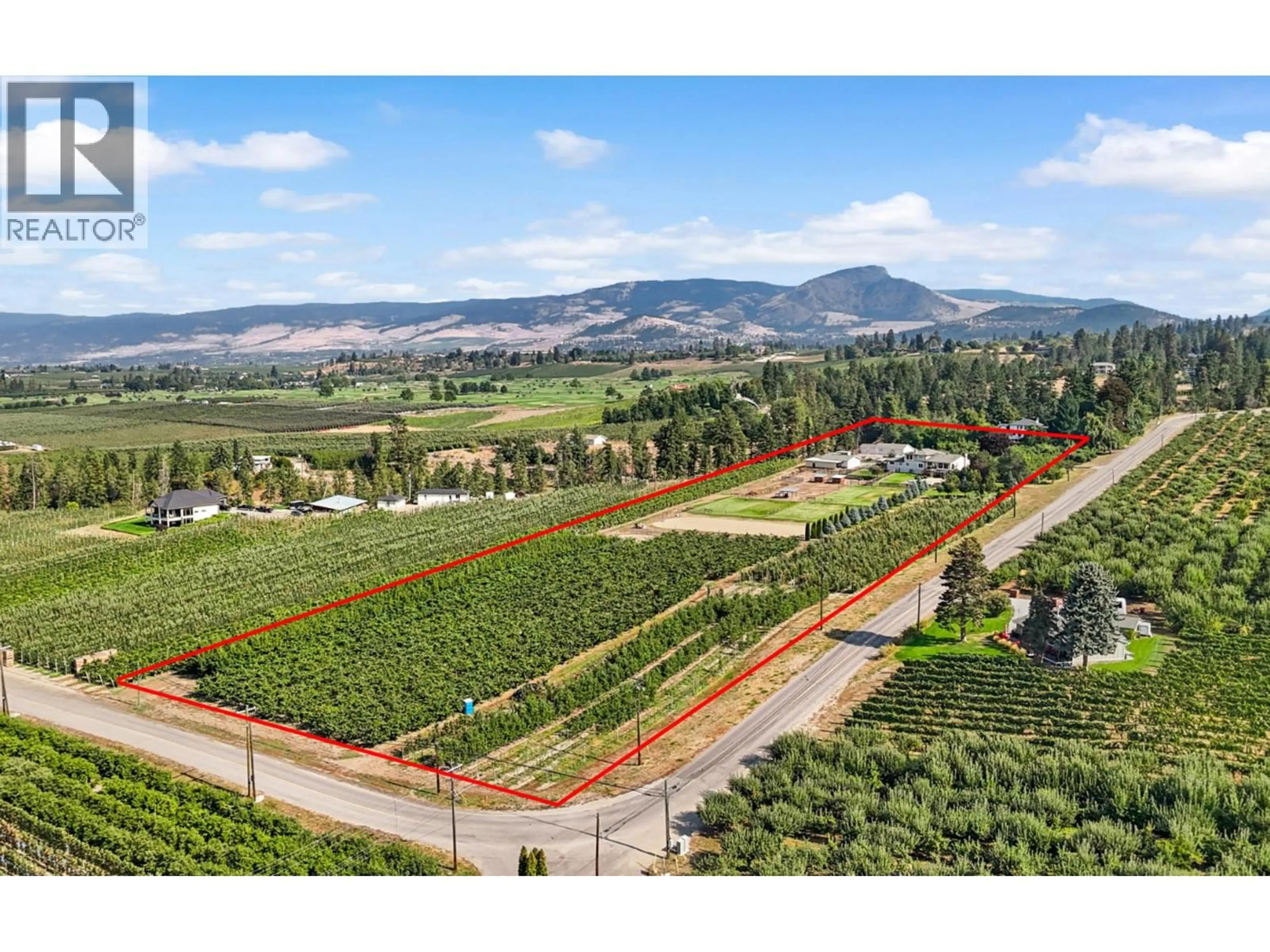 A pic from outside/outdoor area/front of a property/back of a property/a pic from drone, mountain view for 3769 SPIERS ROAD, Kelowna British Columbia V1W4B1