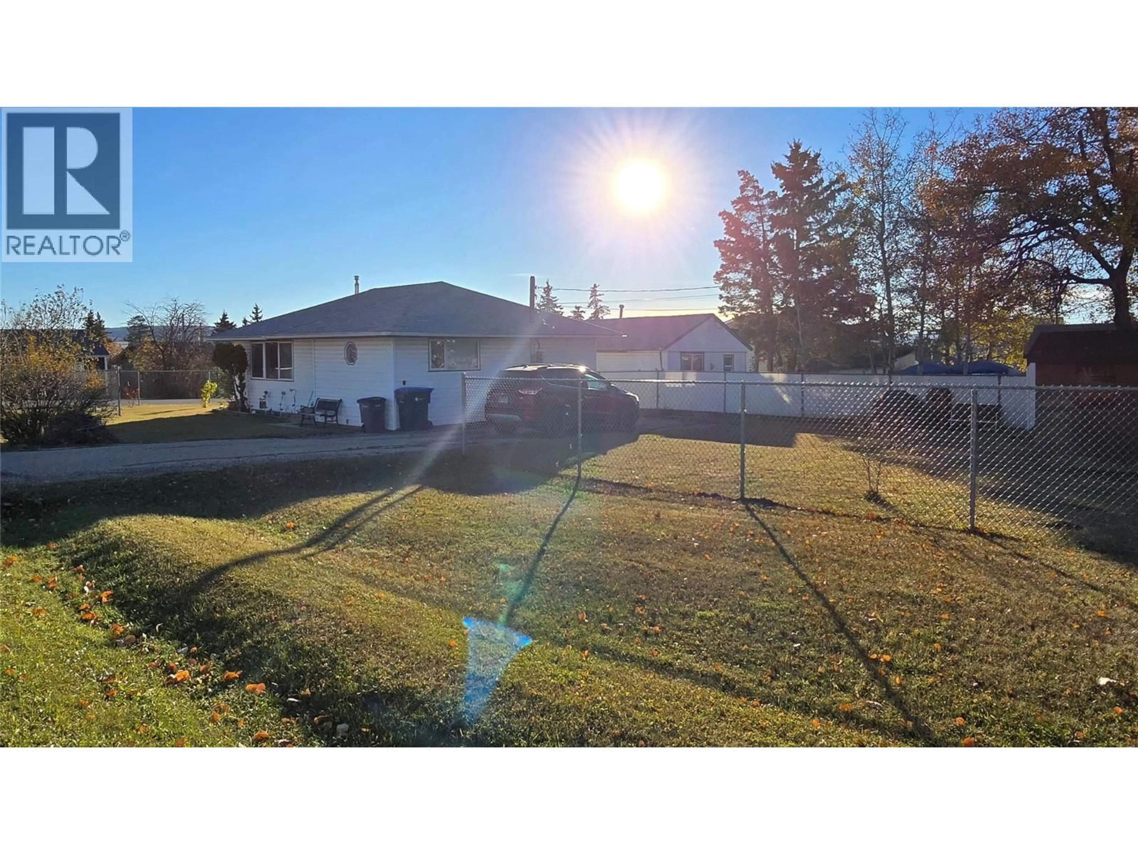 A pic from outside/outdoor area/front of a property/back of a property/a pic from drone, water/lake/river/ocean view for 500 97A AVENUE, Dawson Creek British Columbia V1G1R1