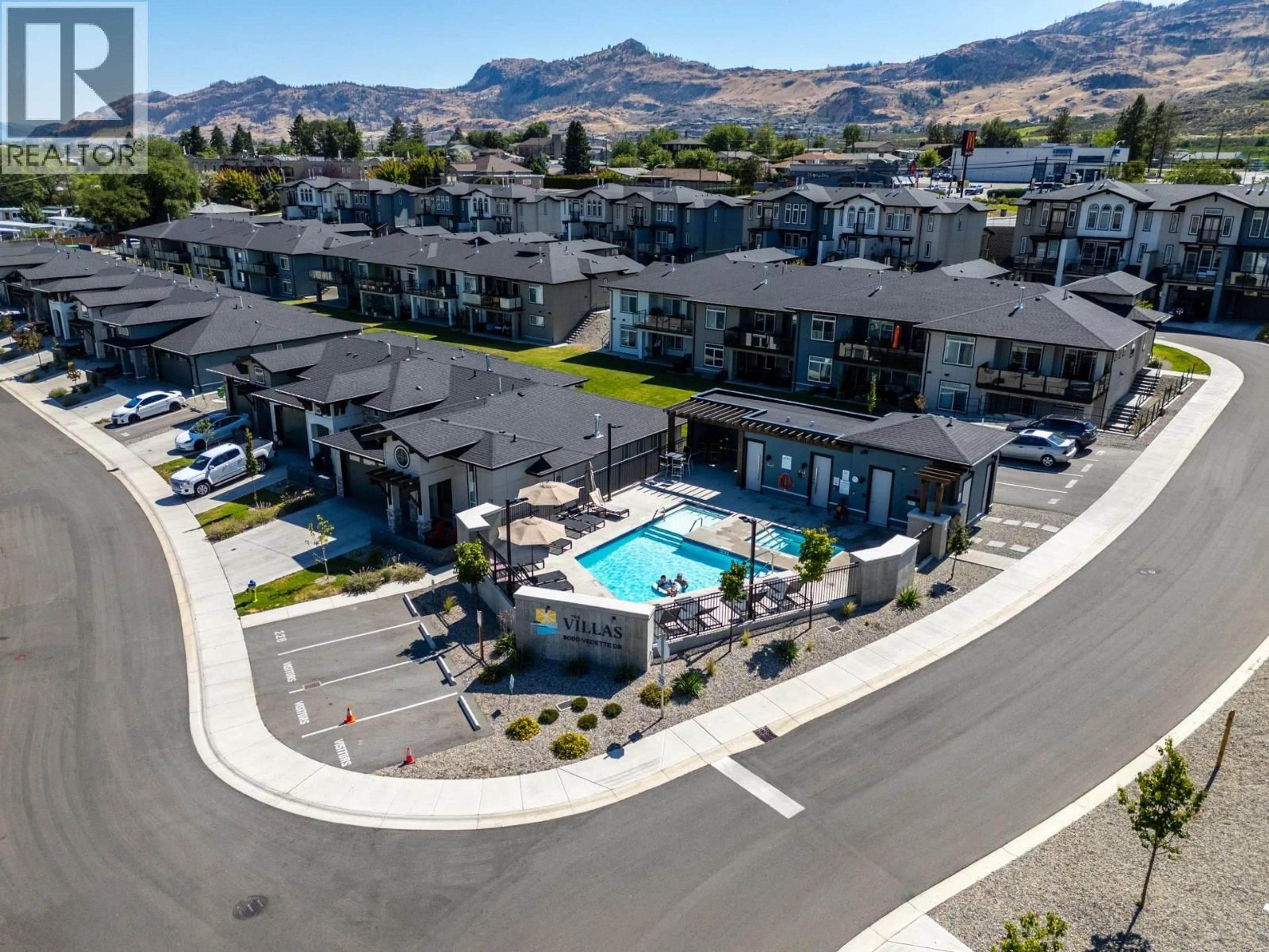 A pic from outside/outdoor area/front of a property/back of a property/a pic from drone, mountain view for 48 - 8000 VEDETTE DRIVE, Osoyoos British Columbia V0H1V2