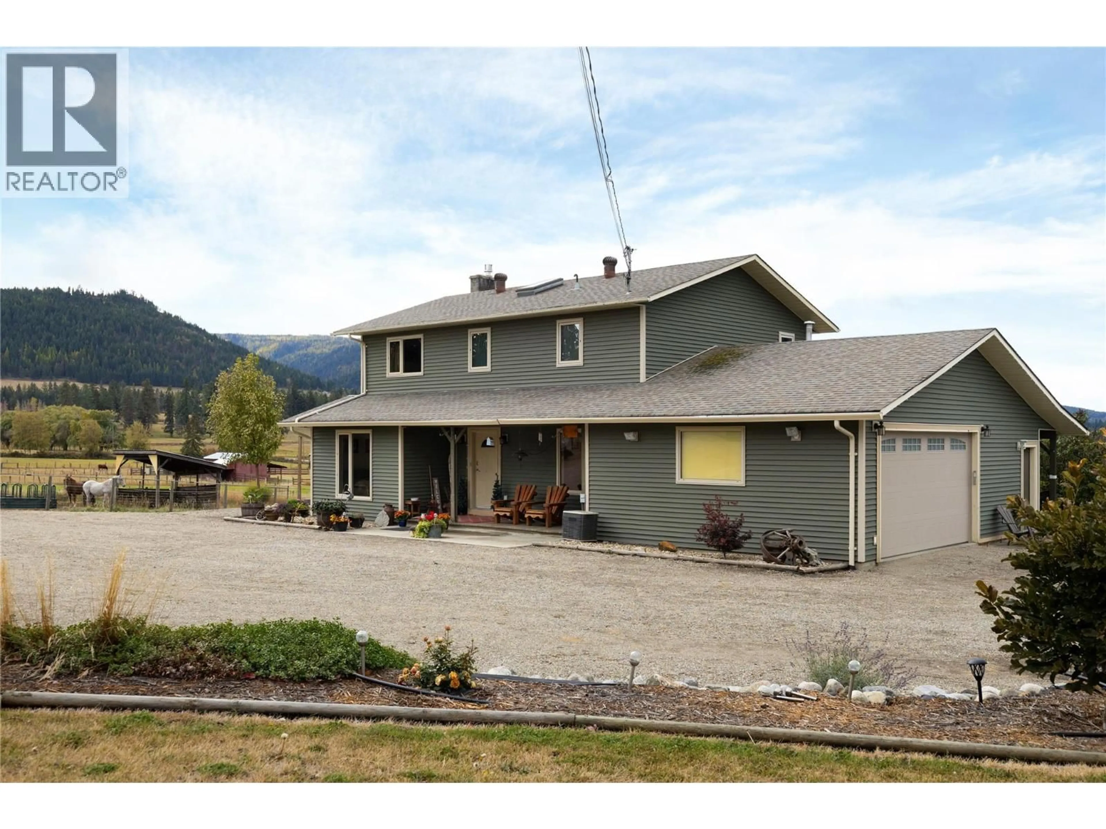 A pic from outside/outdoor area/front of a property/back of a property/a pic from drone, mountain view for 5432 ROCHDELL ROAD, Coldstream British Columbia V1B3E8