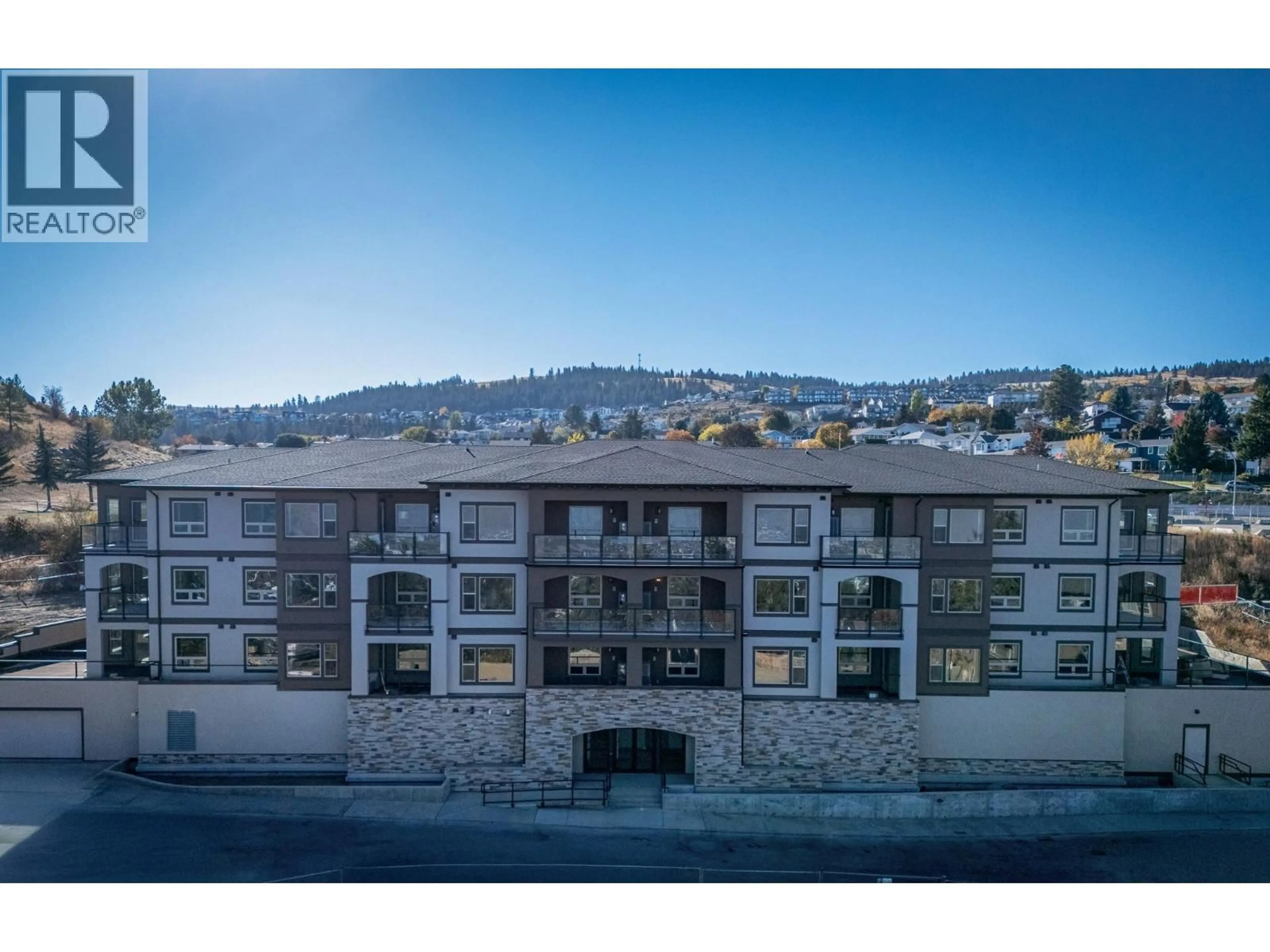 A pic from outside/outdoor area/front of a property/back of a property/a pic from drone, mountain view for 104 - 2171 VAN HORNE DRIVE, Kamloops British Columbia V1S0E2