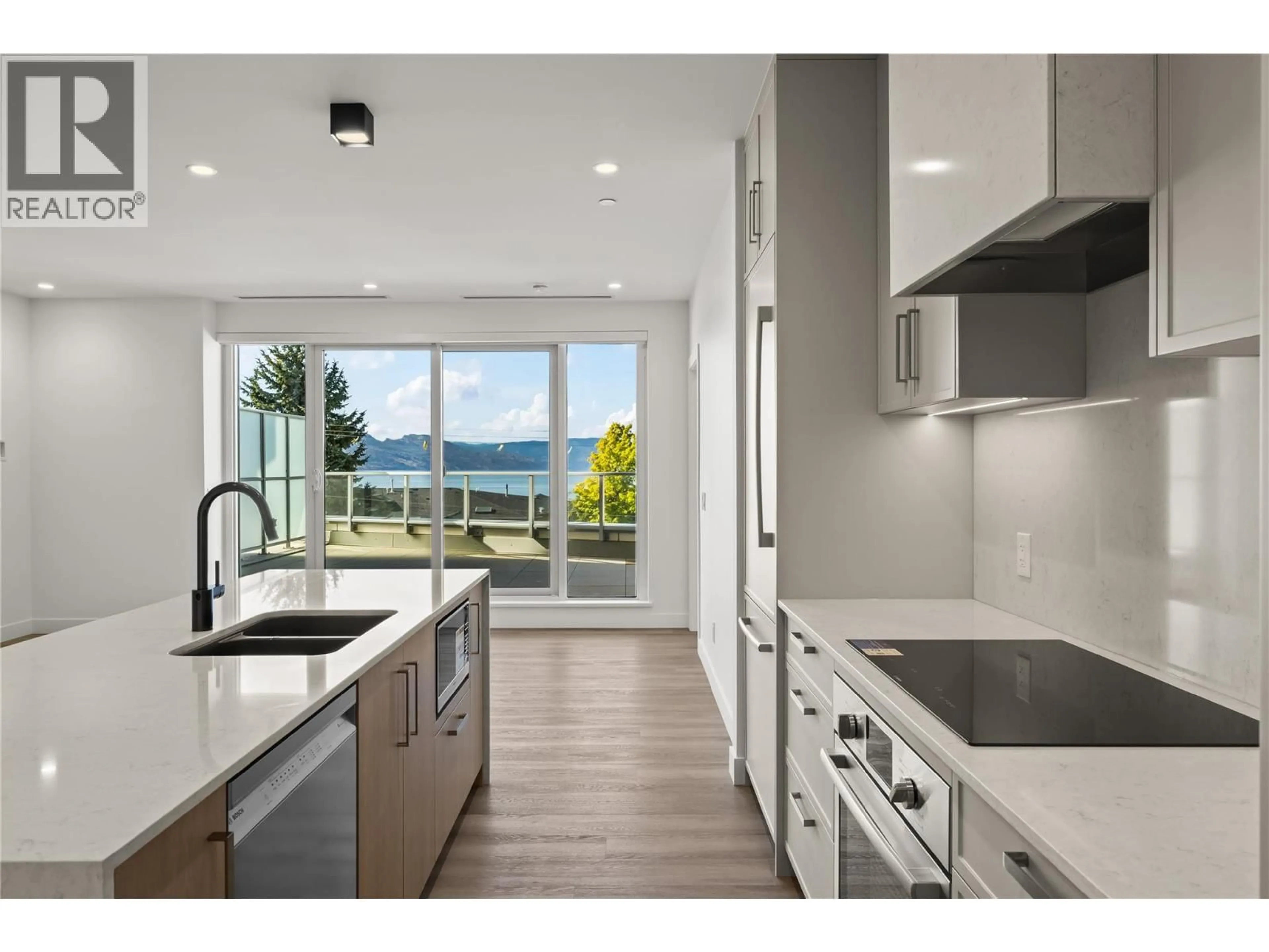 Contemporary kitchen, ceramic/tile floor for 306 - 3340 LAKESHORE DRIVE, Kelowna British Columbia V1W0H6