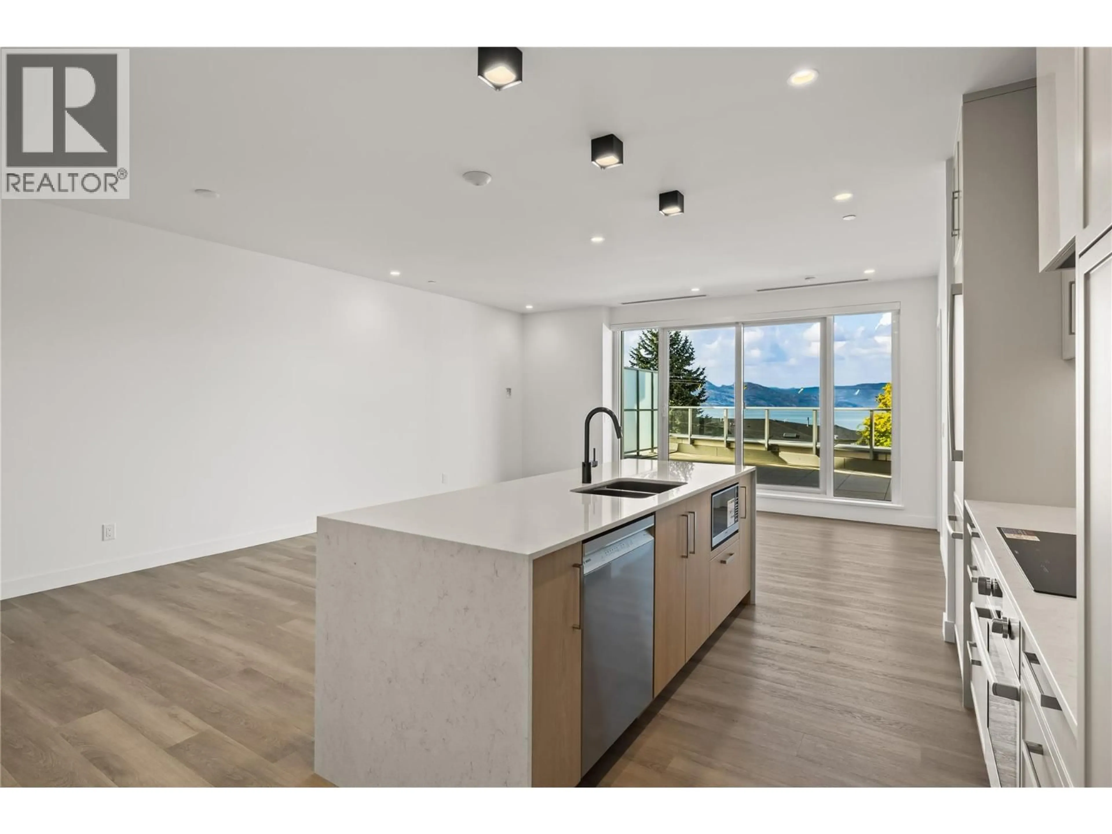 Open concept kitchen, unknown for 306 - 3340 LAKESHORE DRIVE, Kelowna British Columbia V1W0H6