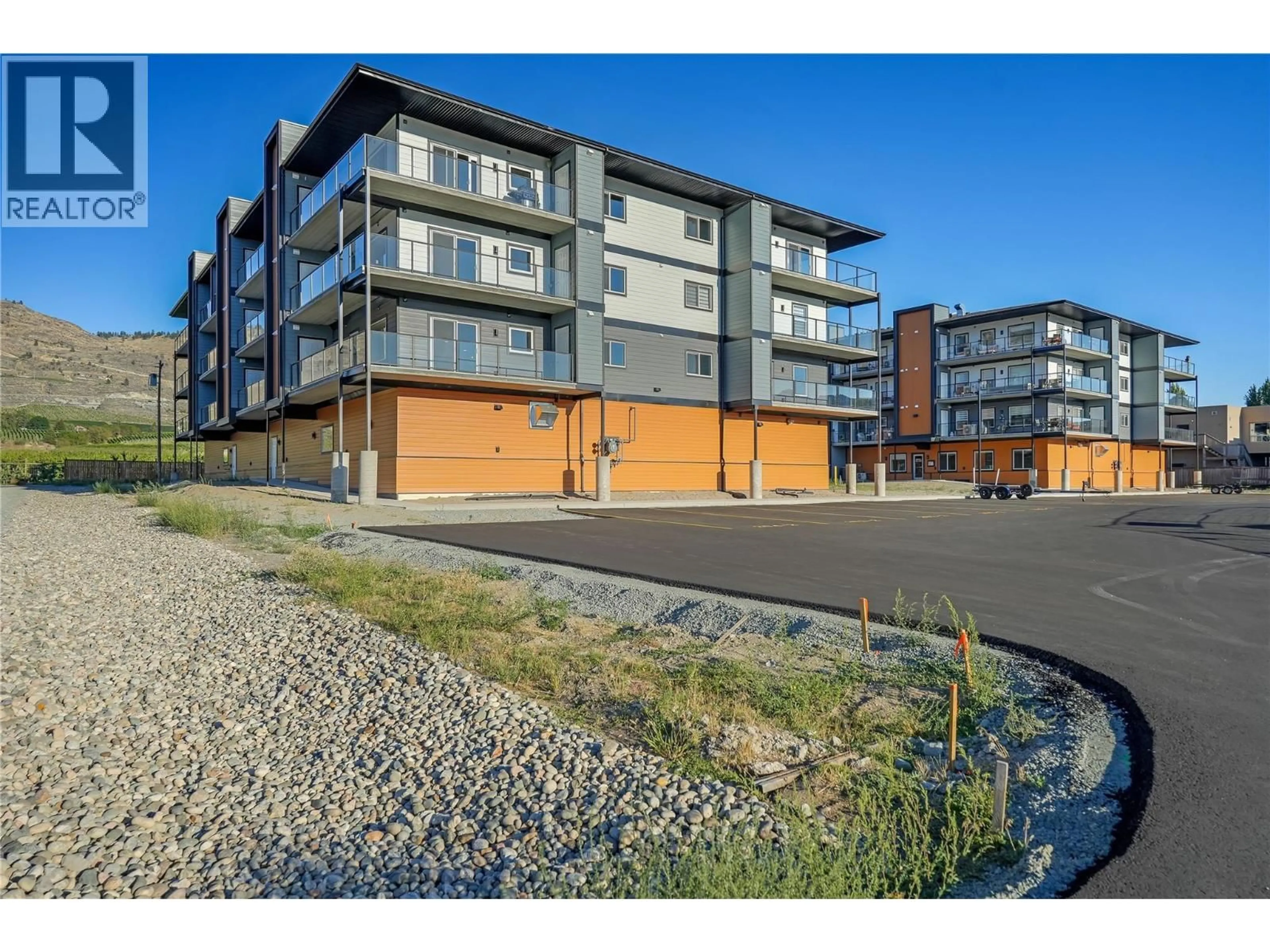 A pic from outside/outdoor area/front of a property/back of a property/a pic from drone, unknown for 407 - 5640 51ST STREET, Osoyoos British Columbia V0H1V6