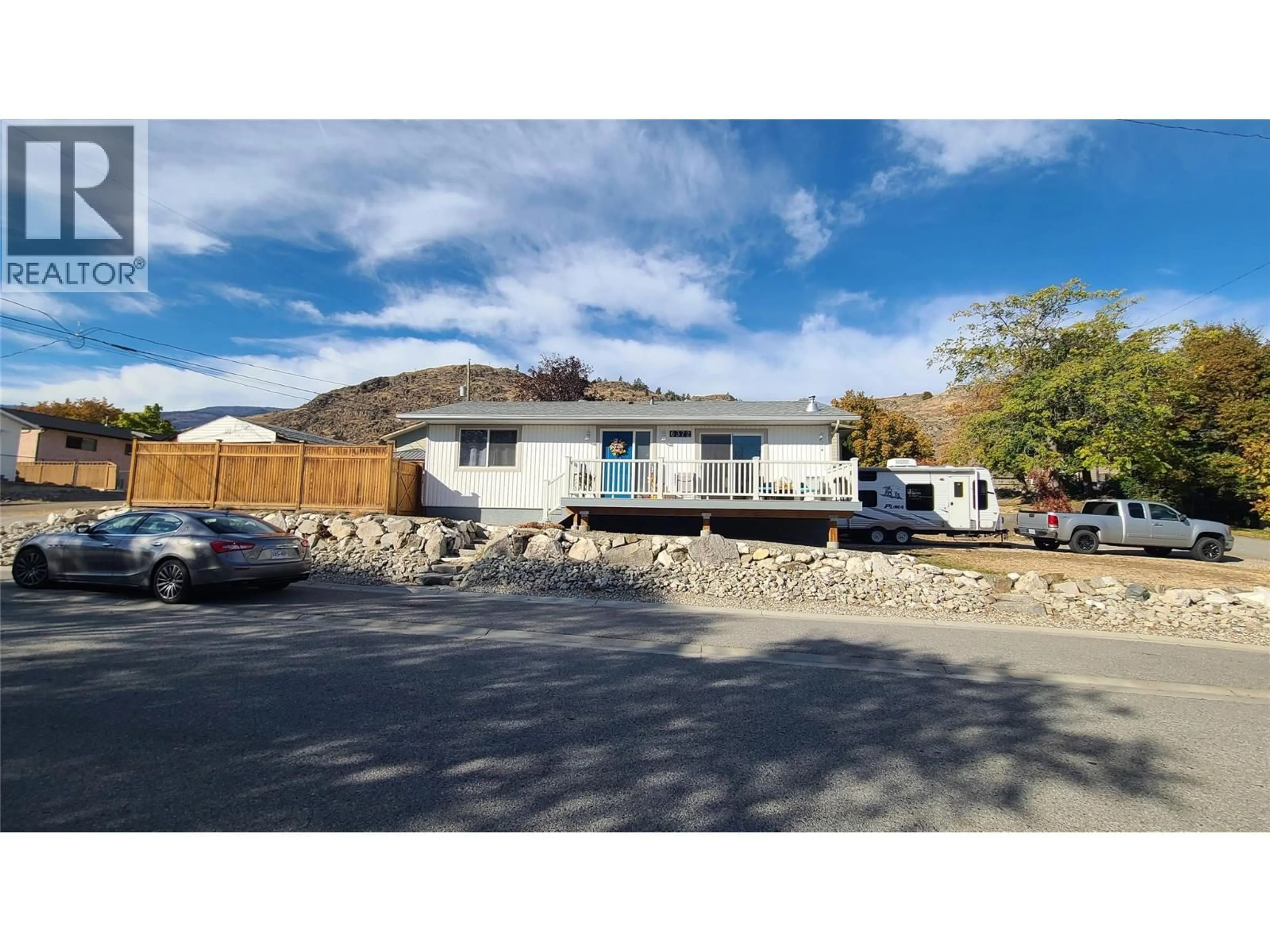 A pic from outside/outdoor area/front of a property/back of a property/a pic from drone, mountain view for 6372 HAVEN STREET, Oliver British Columbia V0H1T0