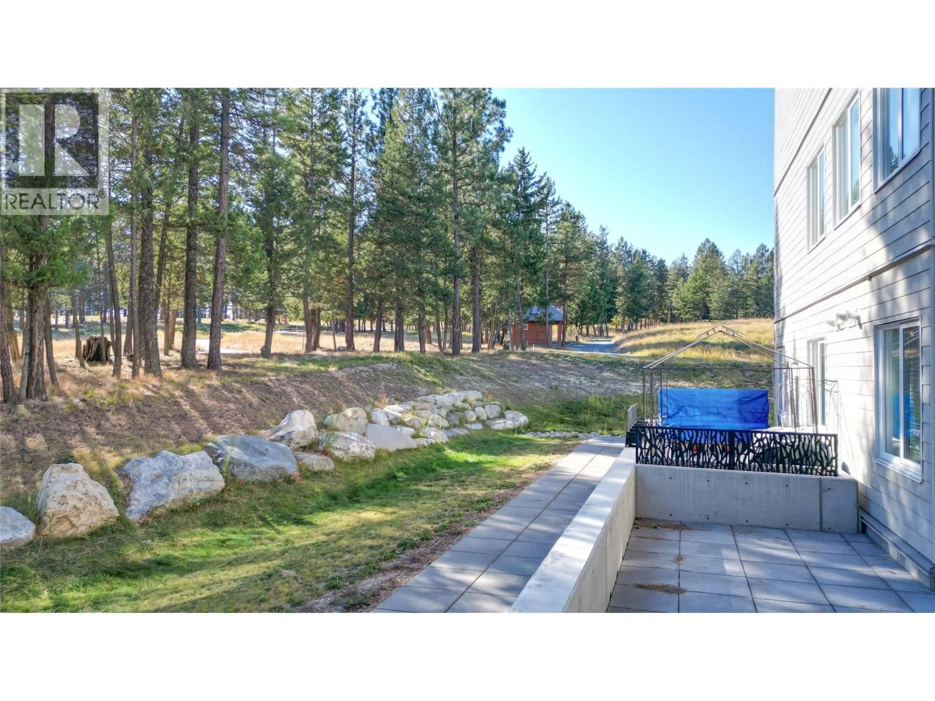A pic from outside/outdoor area/front of a property/back of a property/a pic from drone, forest/trees view for 112 - 355 LEGACY LOOKOUT LOOKOUT, Cranbrook British Columbia V1C0E6