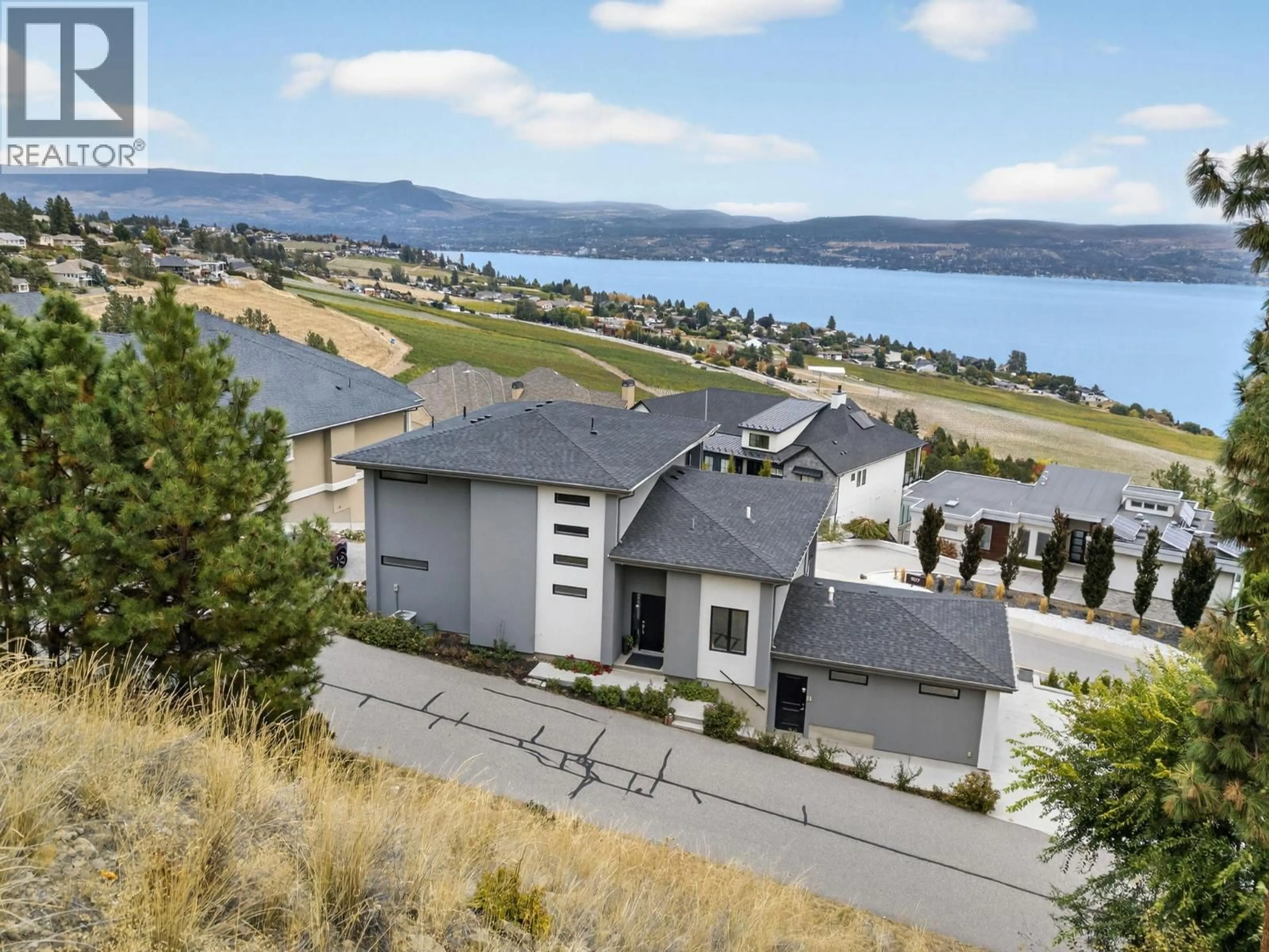 A pic from outside/outdoor area/front of a property/back of a property/a pic from drone, water/lake/river/ocean view for 1534 GREGORY ROAD, West Kelowna British Columbia V4T2V7