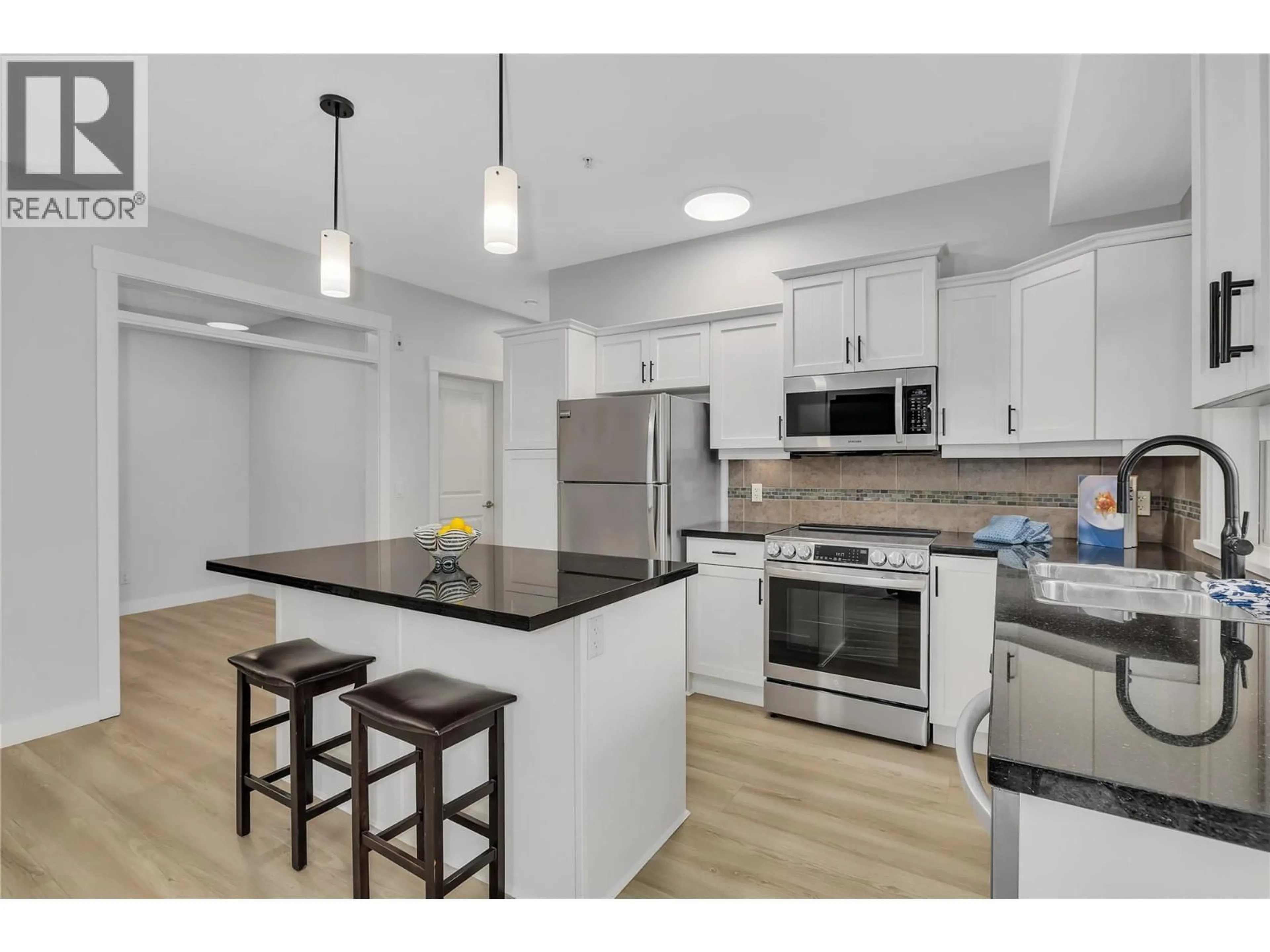 Open concept kitchen, unknown for 112 - 3521 CARRINGTON ROAD, Westbank British Columbia V4T2E6
