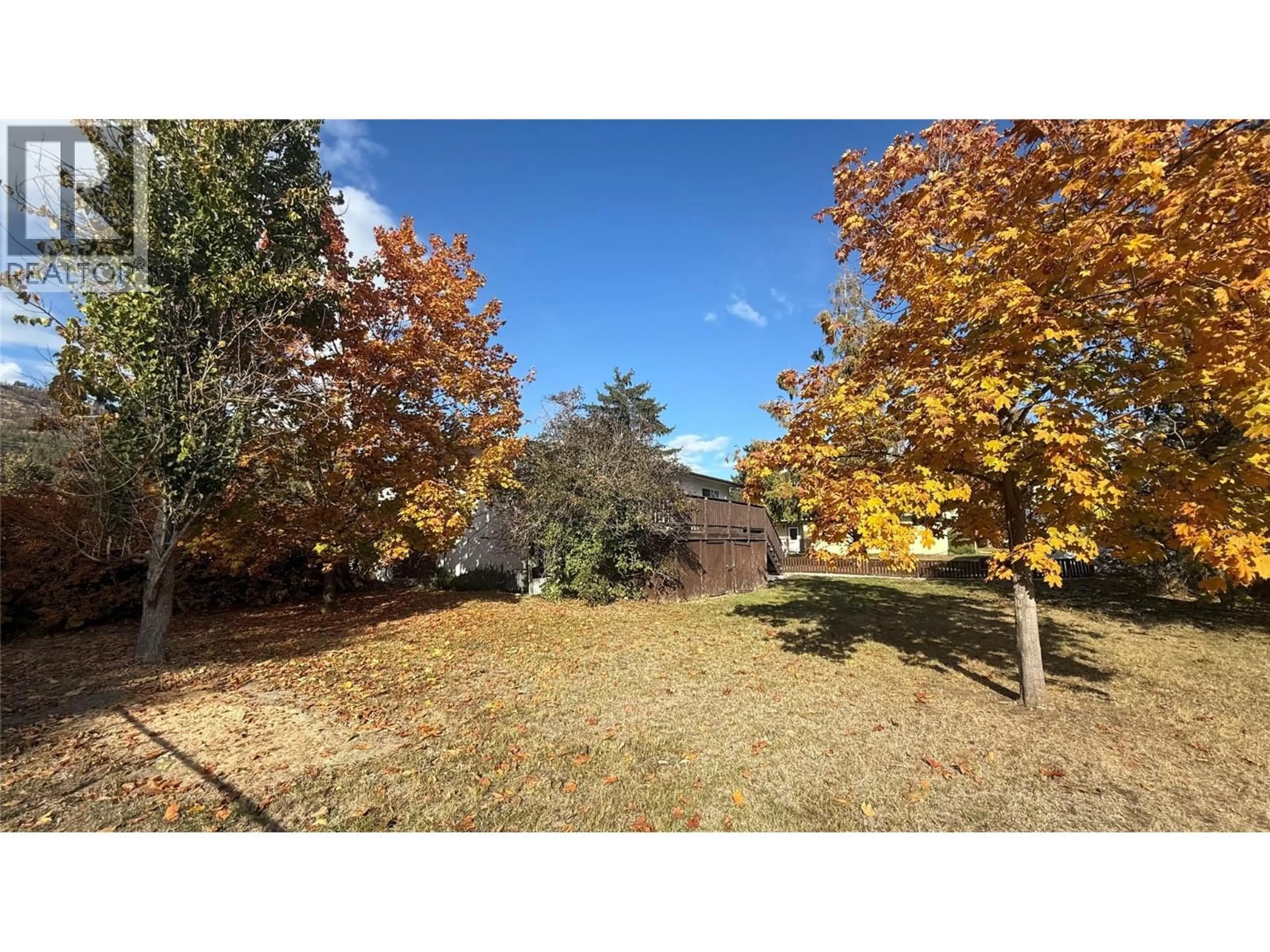 A pic from outside/outdoor area/front of a property/back of a property/a pic from drone, forest/trees view for 169 CARIBOO ROAD, Kelowna British Columbia V1V2E4