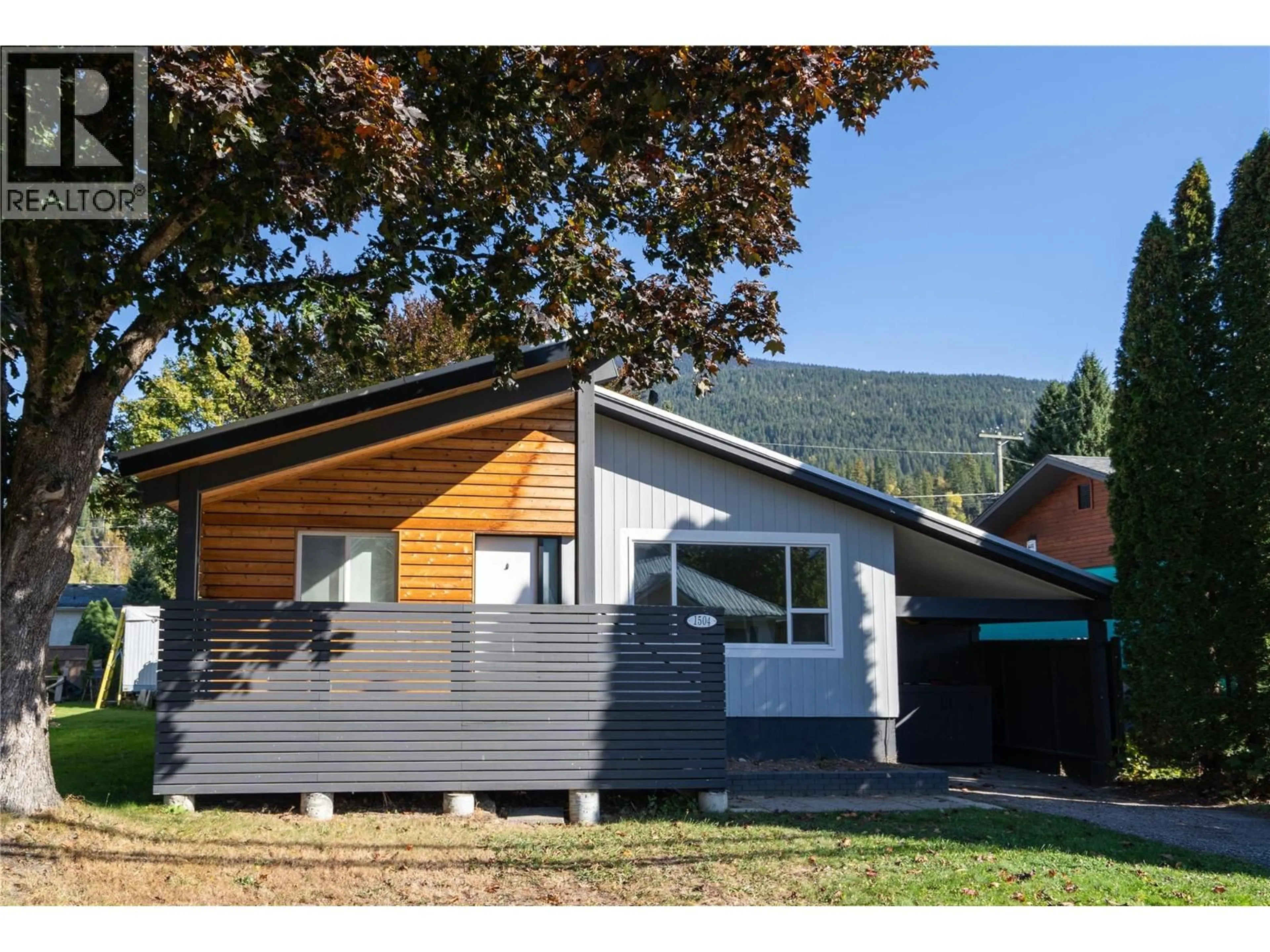 Home with vinyl exterior material, mountain view for 1504 THIRD STREET WEST, Revelstoke British Columbia V0E2S0