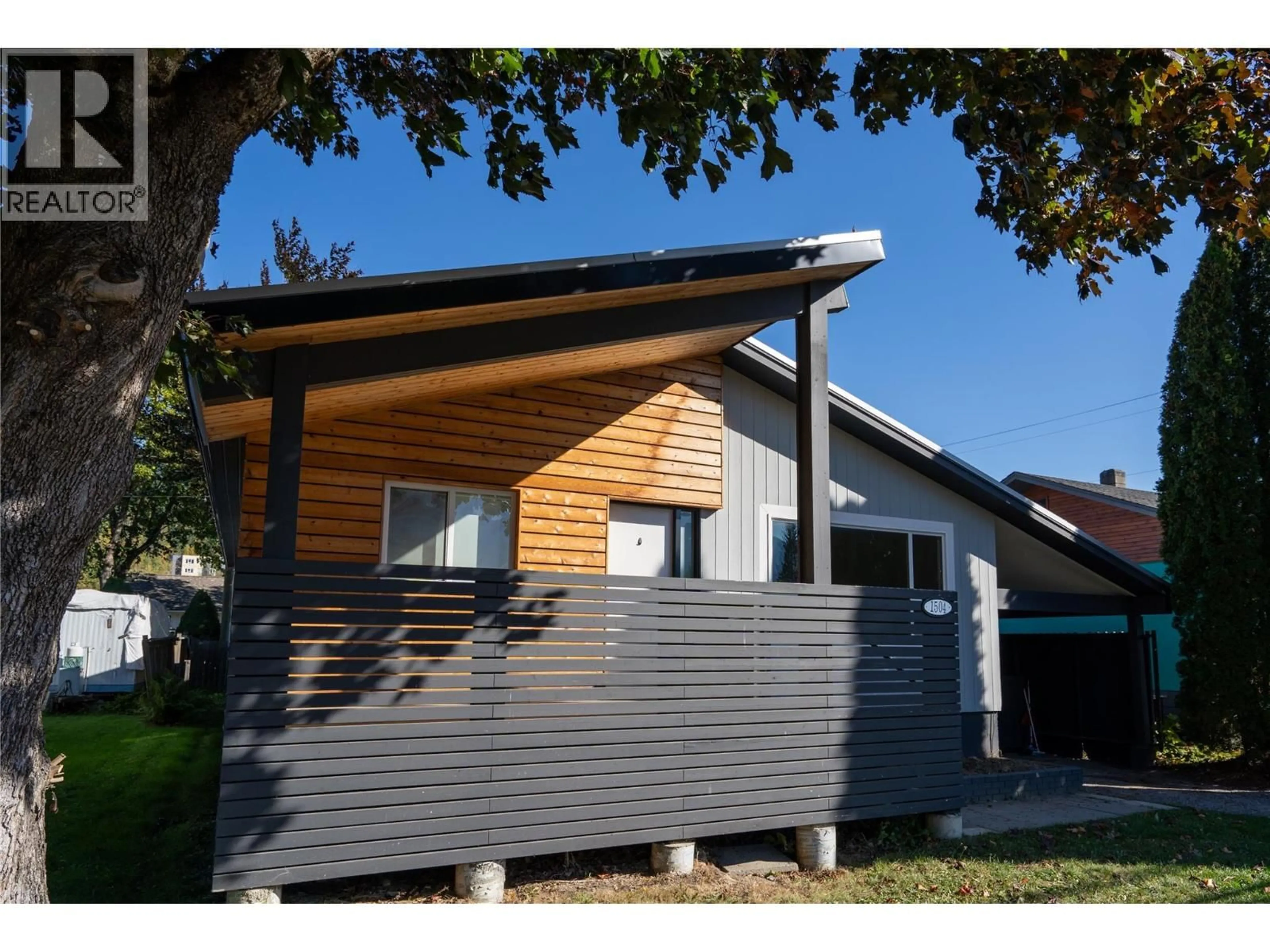 Home with vinyl exterior material, street for 1504 THIRD STREET WEST, Revelstoke British Columbia V0E2S0