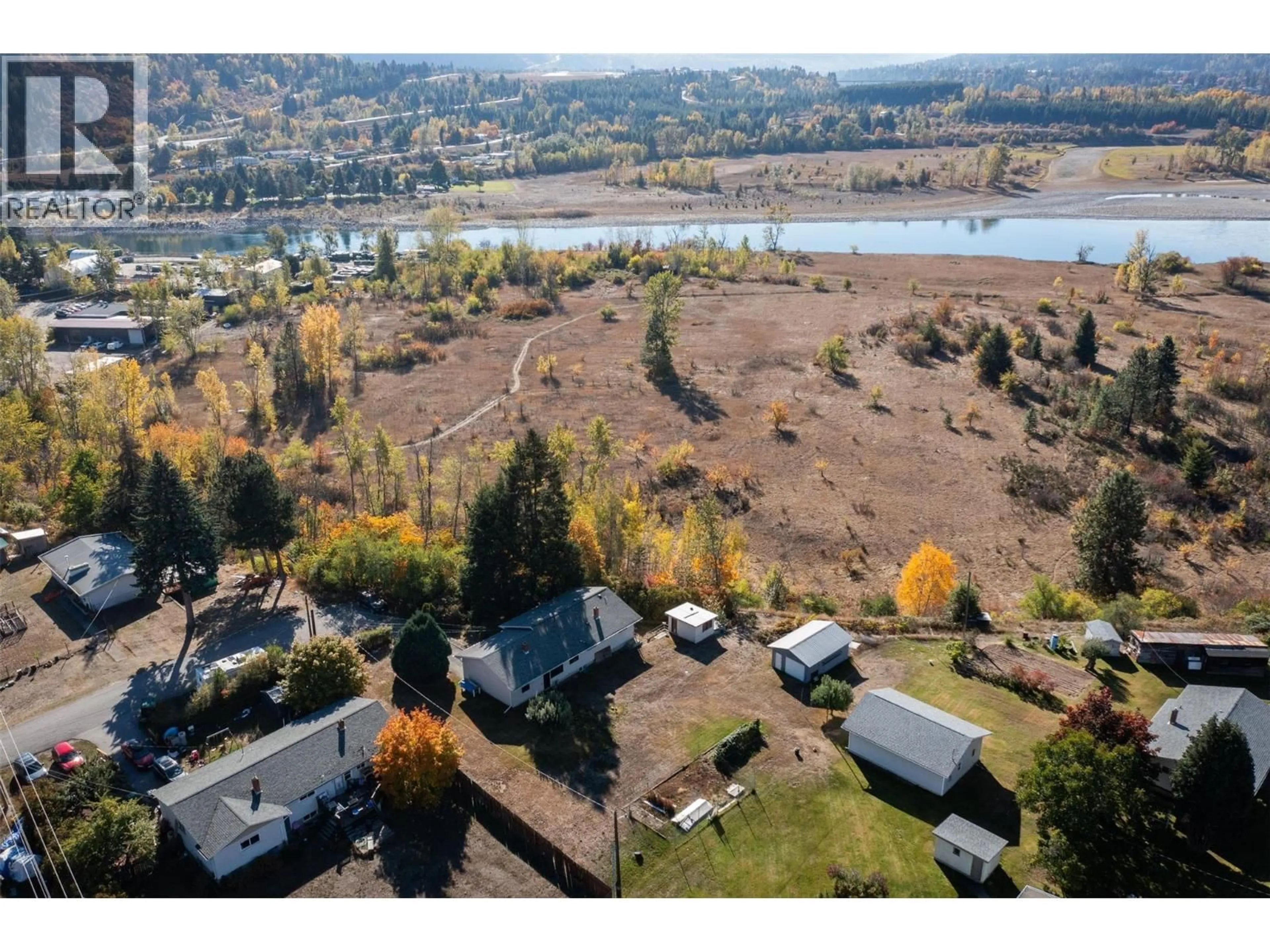 A pic from outside/outdoor area/front of a property/back of a property/a pic from drone, water/lake/river/ocean view for 832 KOOTENAY ROAD, Castlegar British Columbia V1N4K2