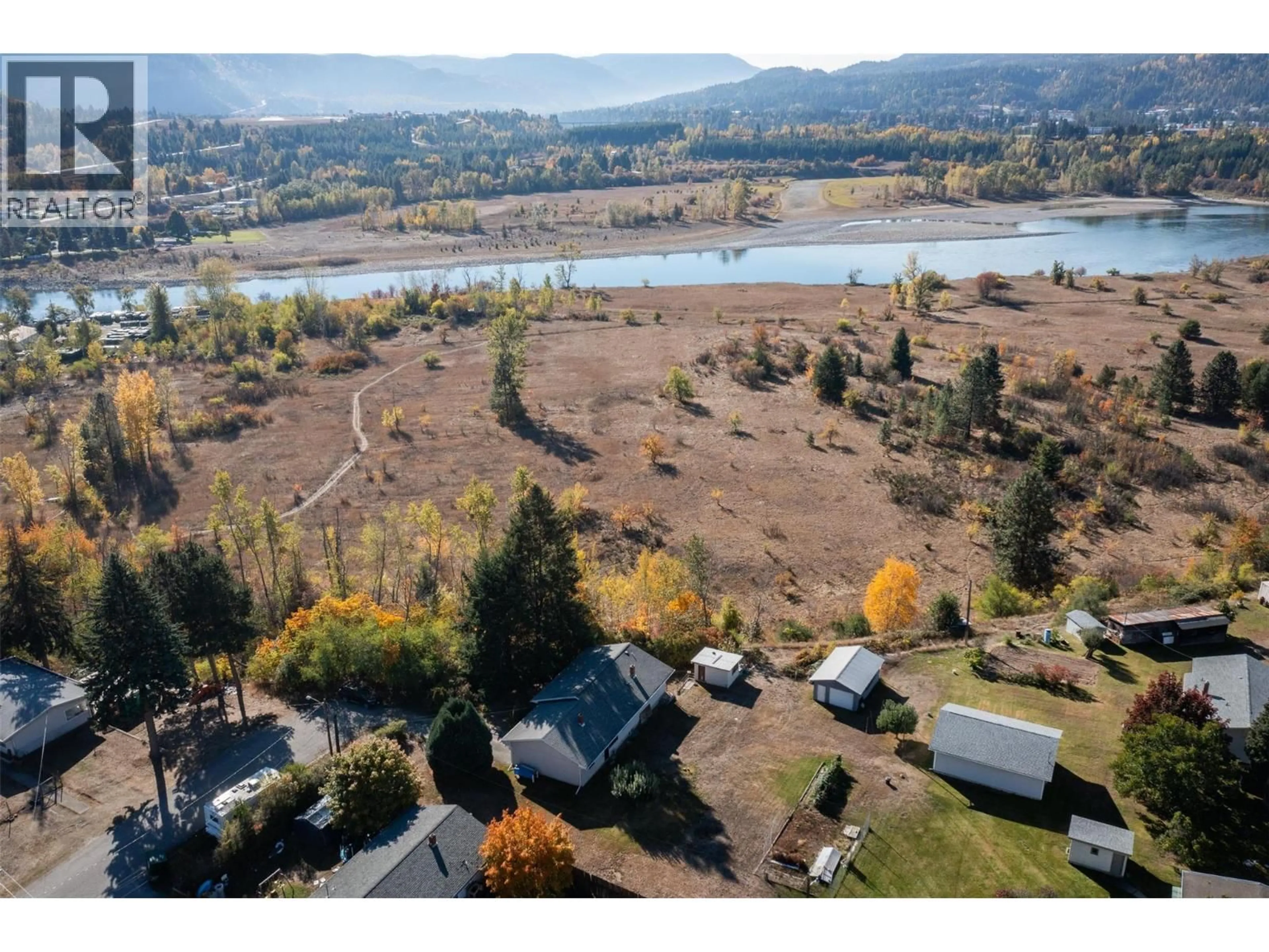 A pic from outside/outdoor area/front of a property/back of a property/a pic from drone, water/lake/river/ocean view for 832 KOOTENAY ROAD, Castlegar British Columbia V1N4K2