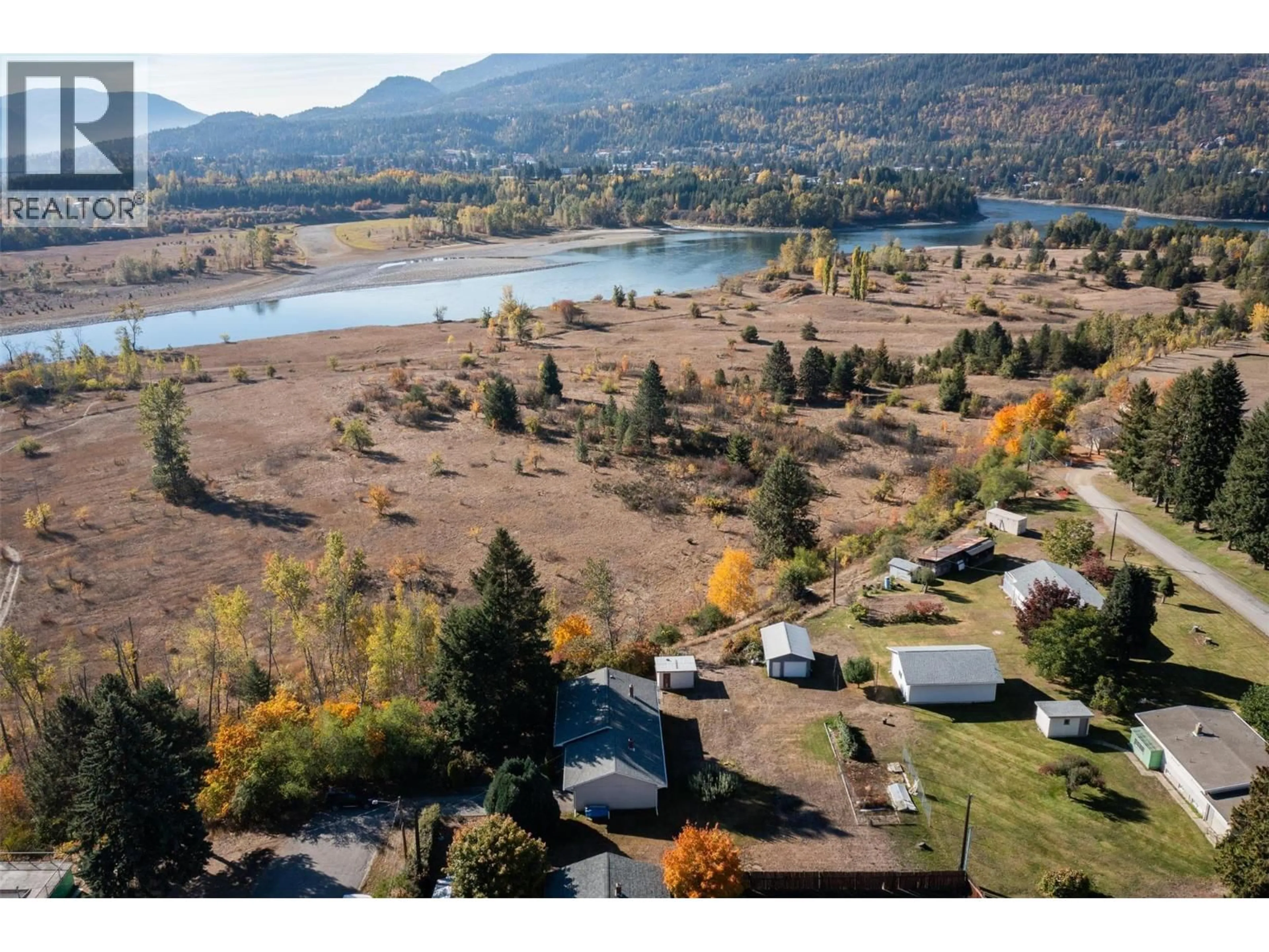 A pic from outside/outdoor area/front of a property/back of a property/a pic from drone, water/lake/river/ocean view for 832 KOOTENAY ROAD, Castlegar British Columbia V1N4K2