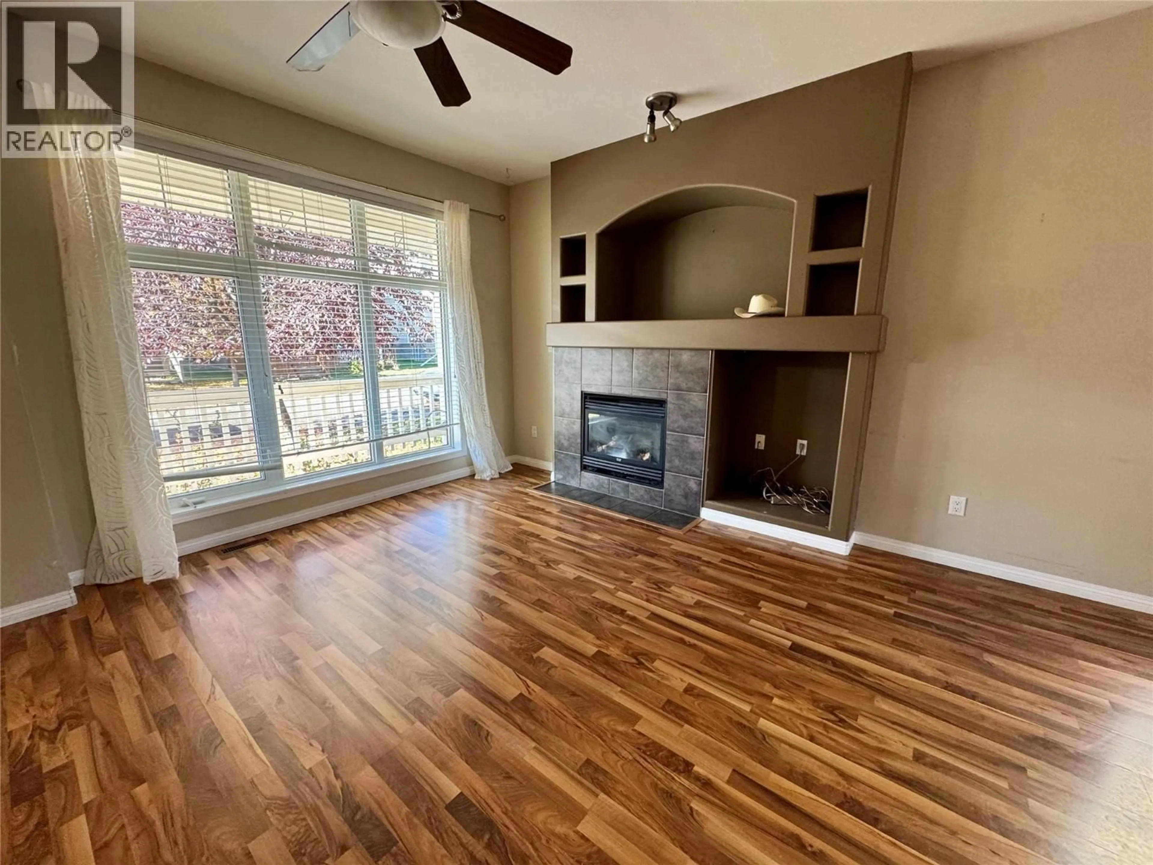 Living room with furniture, wood/laminate floor for 2205 WESTSIDE PARK AVENUE, Invermere British Columbia V0A1K4