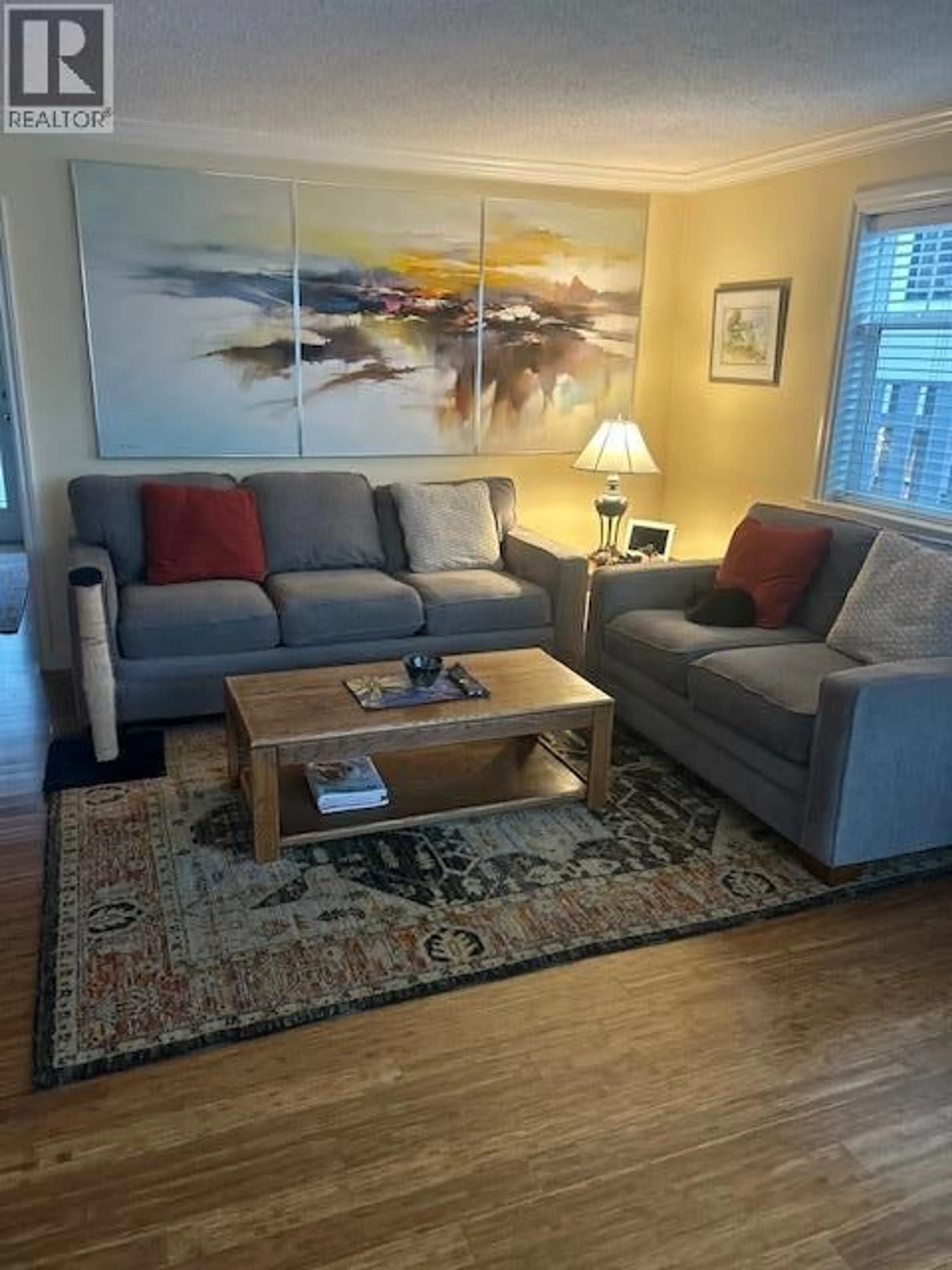 Living room with furniture, unknown for 3547 LAKESHORE ROAD, Kelowna British Columbia V1Y1W6
