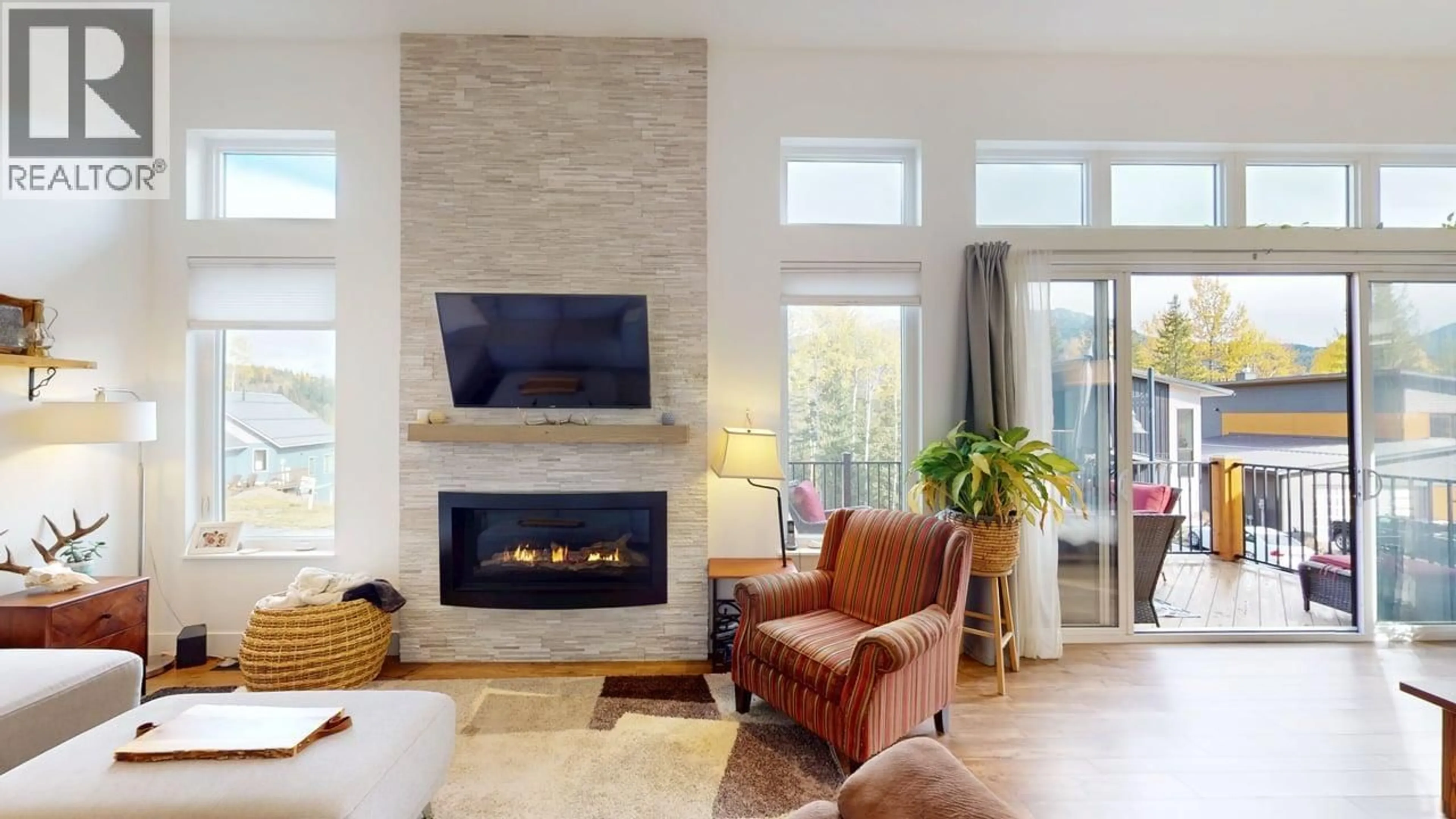 Living room with furniture, ceramic/tile floor for 5 ALPINE TRAIL PLACE, Fernie British Columbia V0B1M5