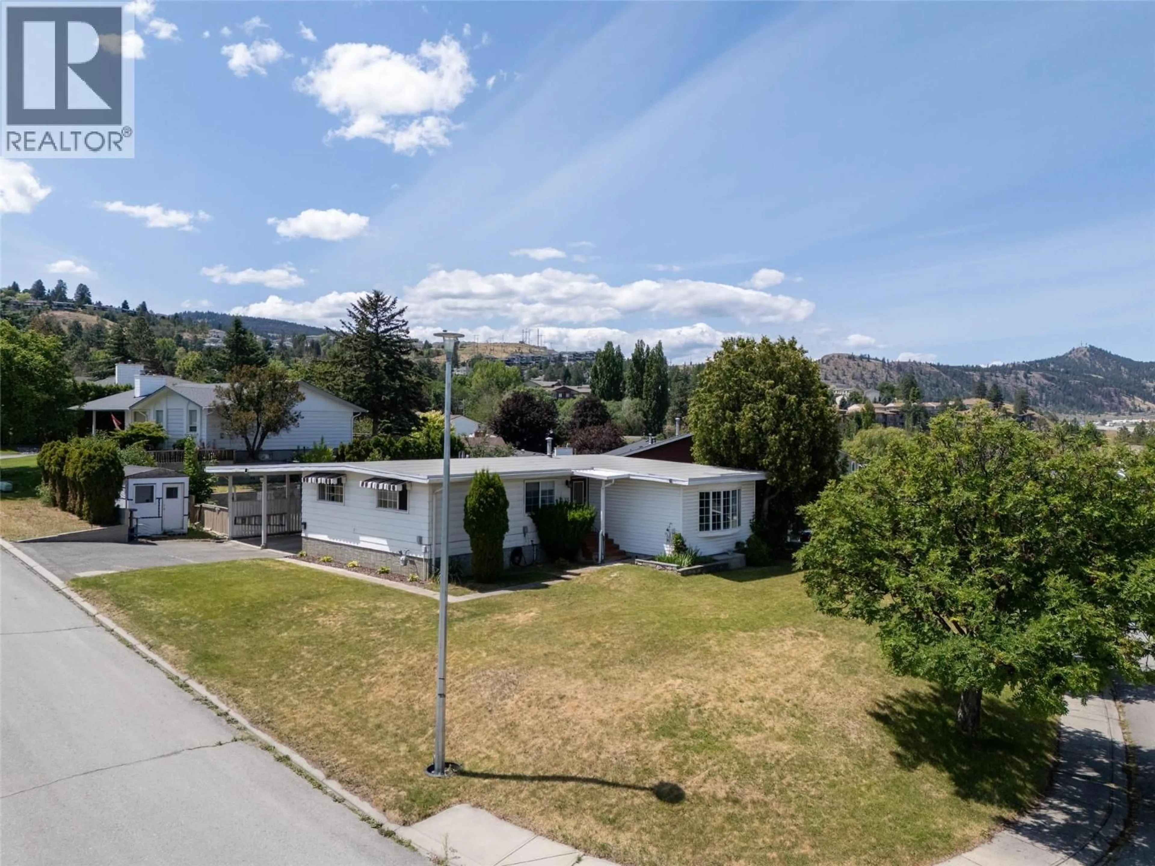 A pic from outside/outdoor area/front of a property/back of a property/a pic from drone, unknown for 135 WHITESHIELD CRESCENT, Kamloops British Columbia V2E1H2