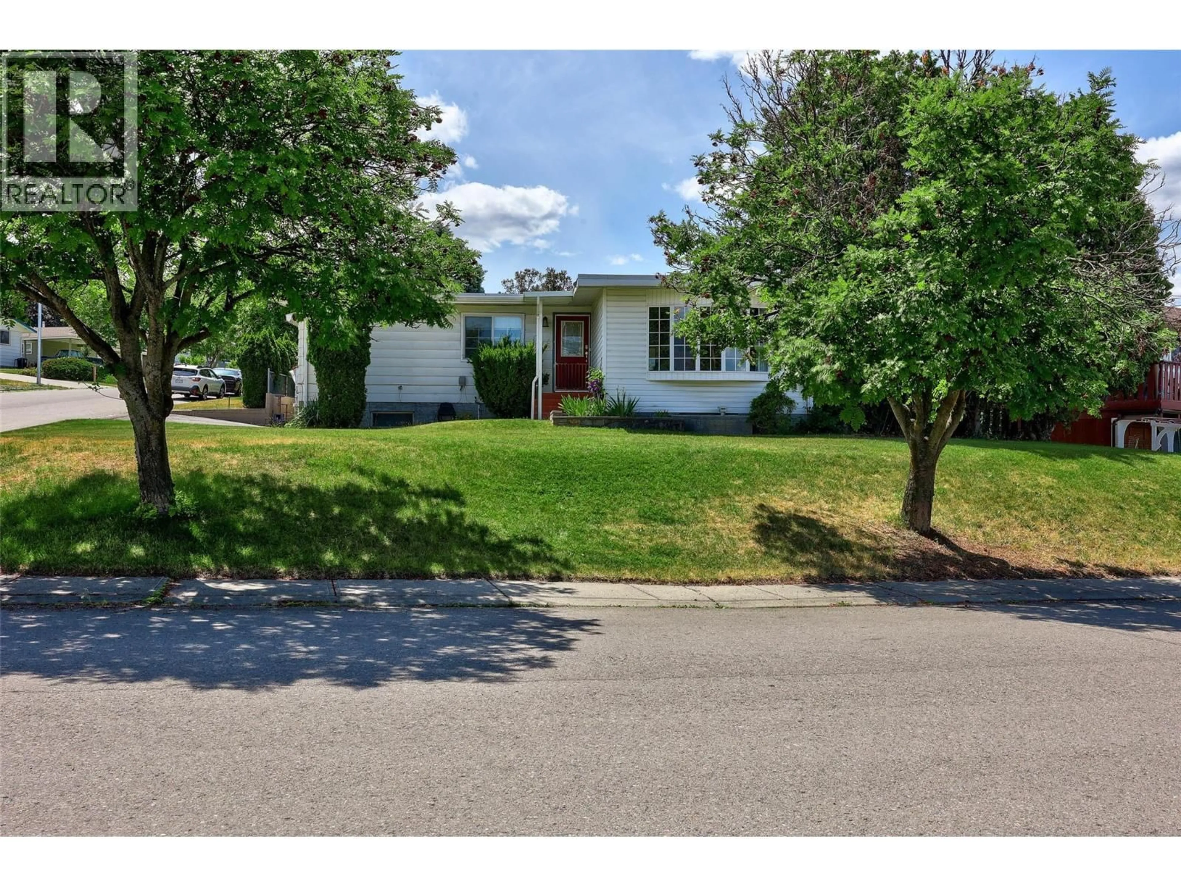 Home with vinyl exterior material, street for 135 WHITESHIELD CRESCENT, Kamloops British Columbia V2E1H2