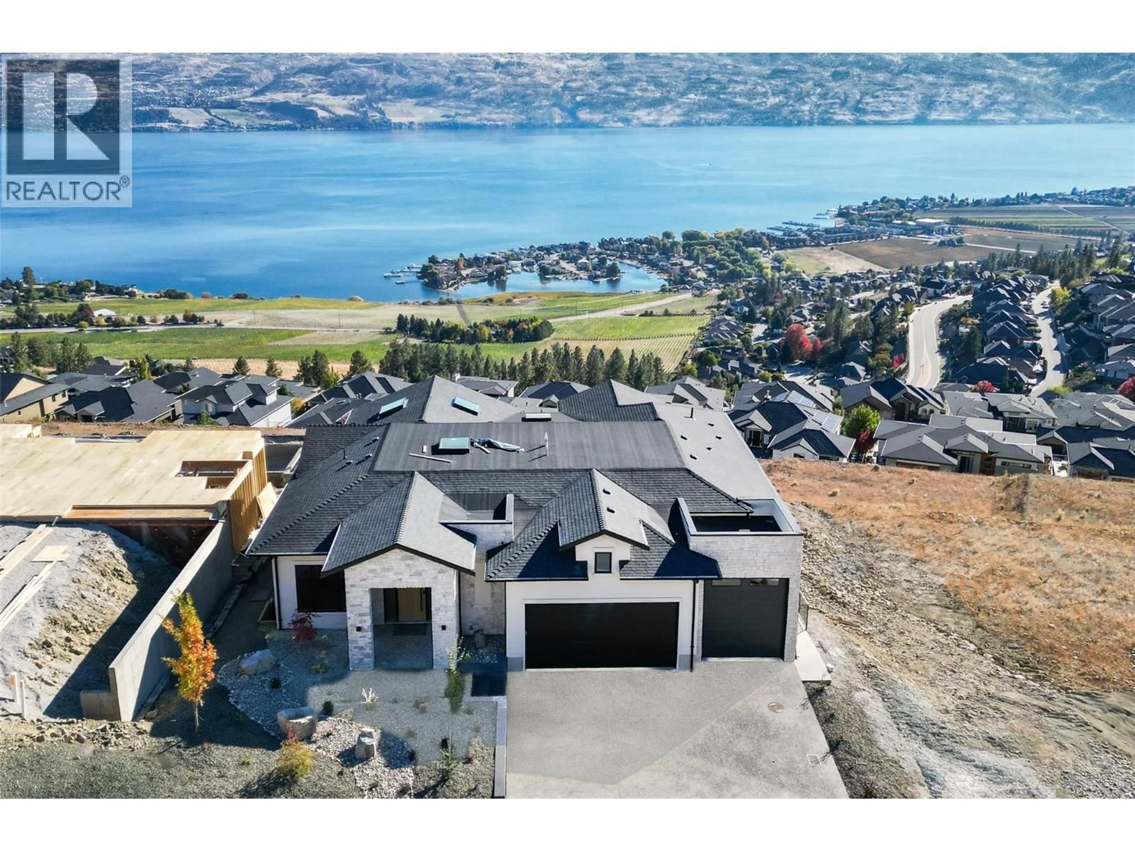 A pic from outside/outdoor area/front of a property/back of a property/a pic from drone, water/lake/river/ocean view for 1403 VINEYARD DRIVE, West Kelowna British Columbia V4T3H9