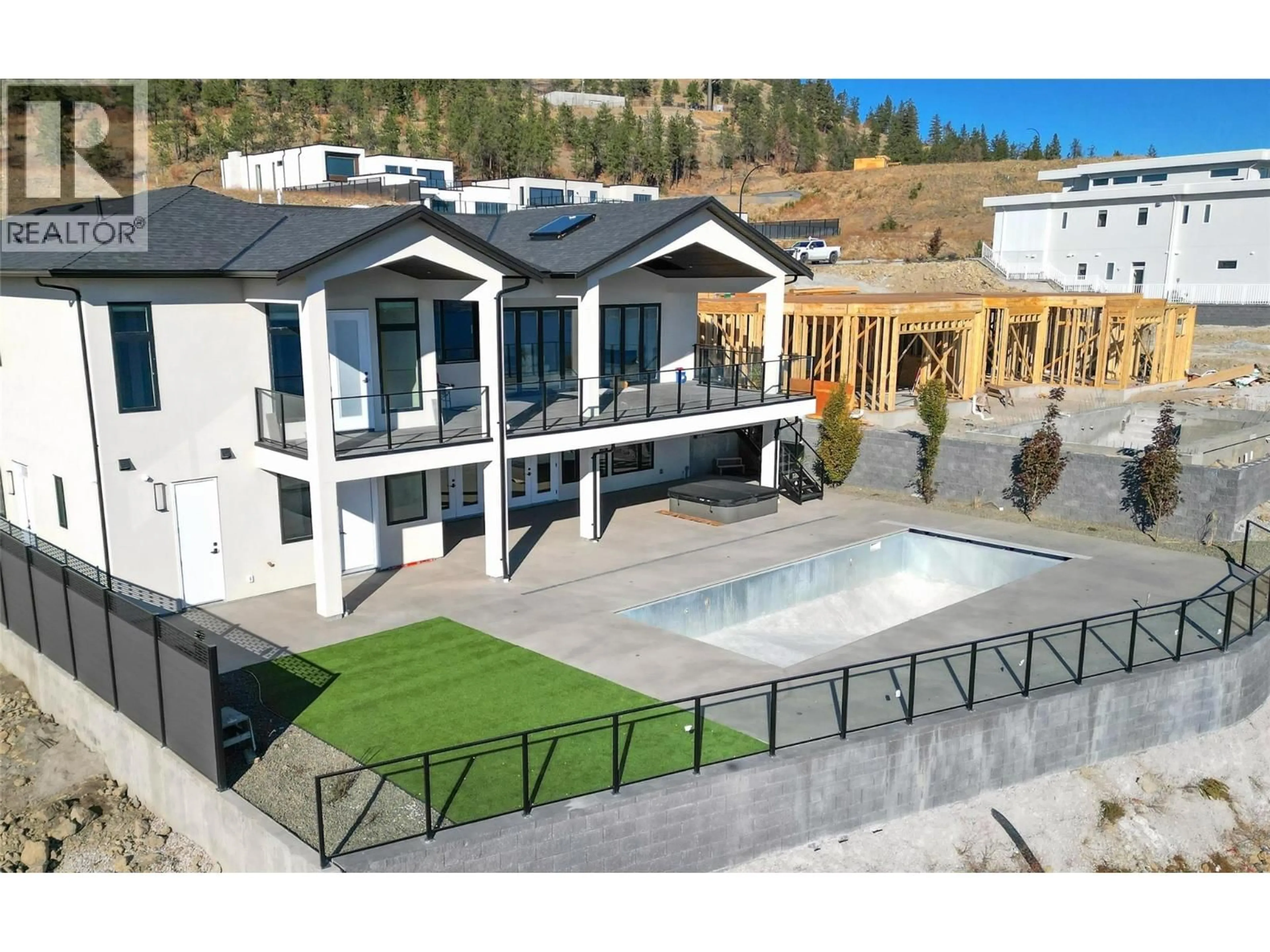 A pic from outside/outdoor area/front of a property/back of a property/a pic from drone, mountain view for 1403 VINEYARD DRIVE, West Kelowna British Columbia V4T3H9