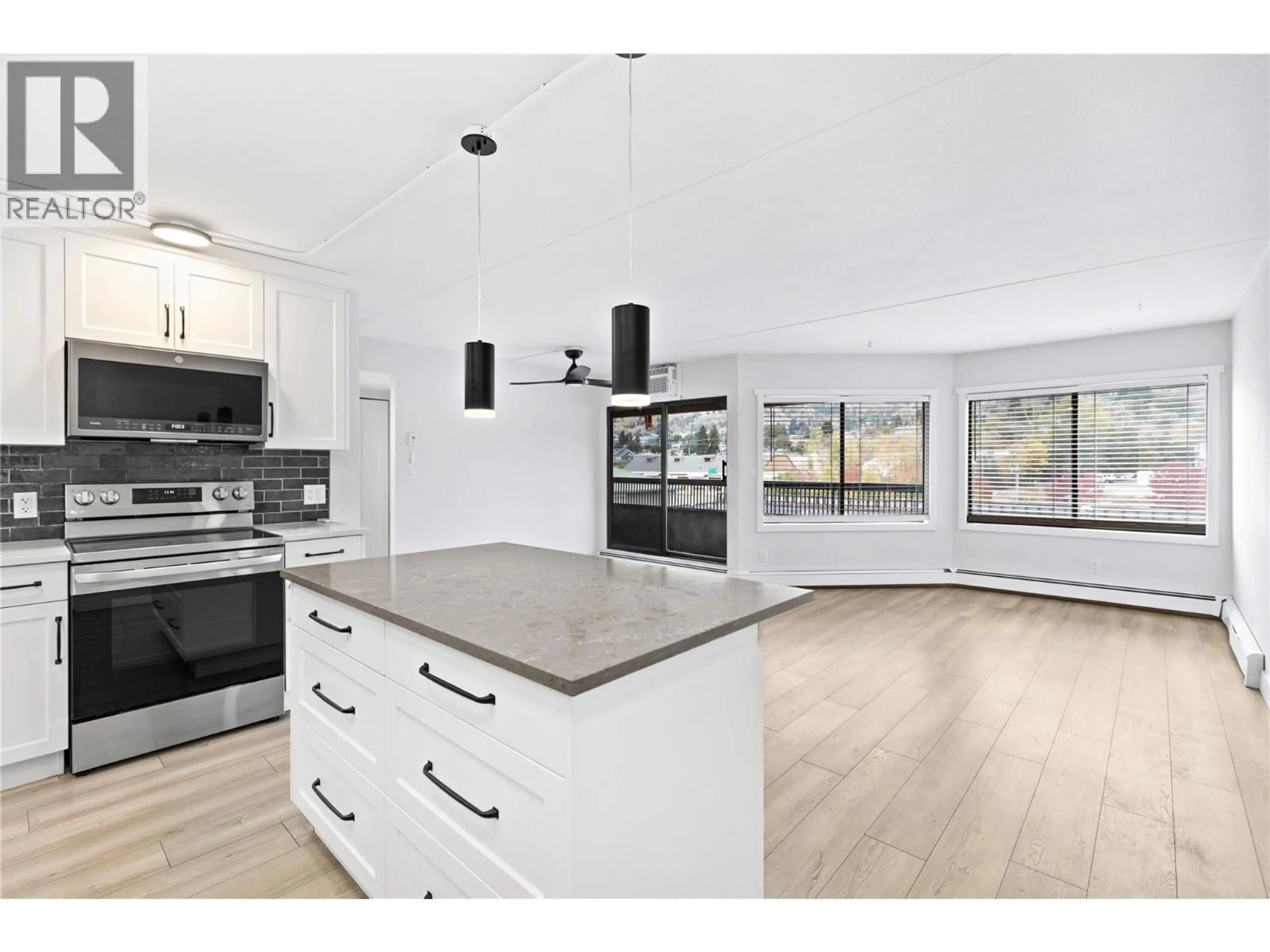 Open concept kitchen, wood/laminate floor for 403 - 525 NICOLA STREET, Kamloops British Columbia V2C6J5