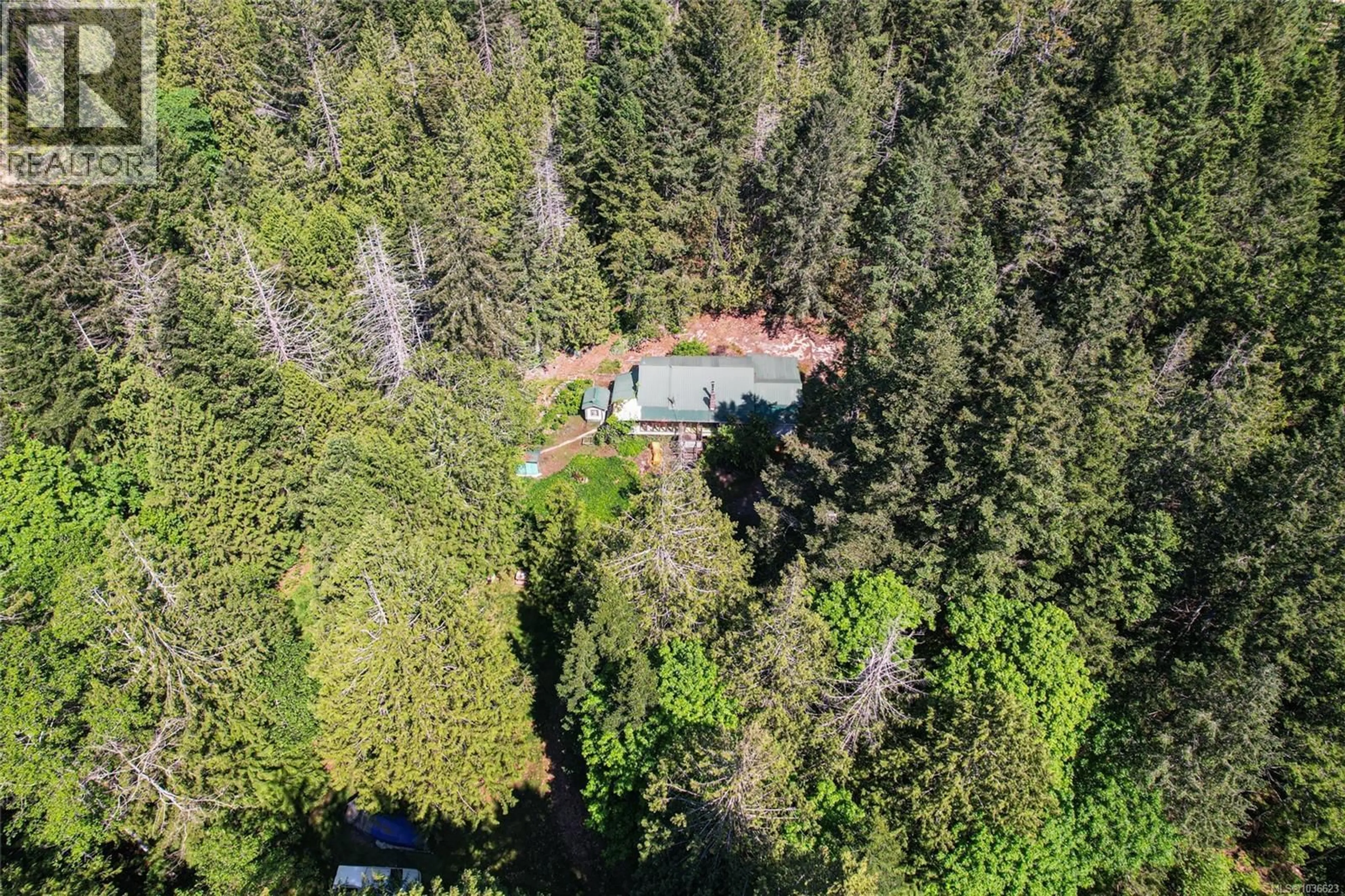 A pic from outside/outdoor area/front of a property/back of a property/a pic from drone, forest/trees view for 3070 FAIRBAIRN ROAD, Gabriola Island British Columbia V0R1X7