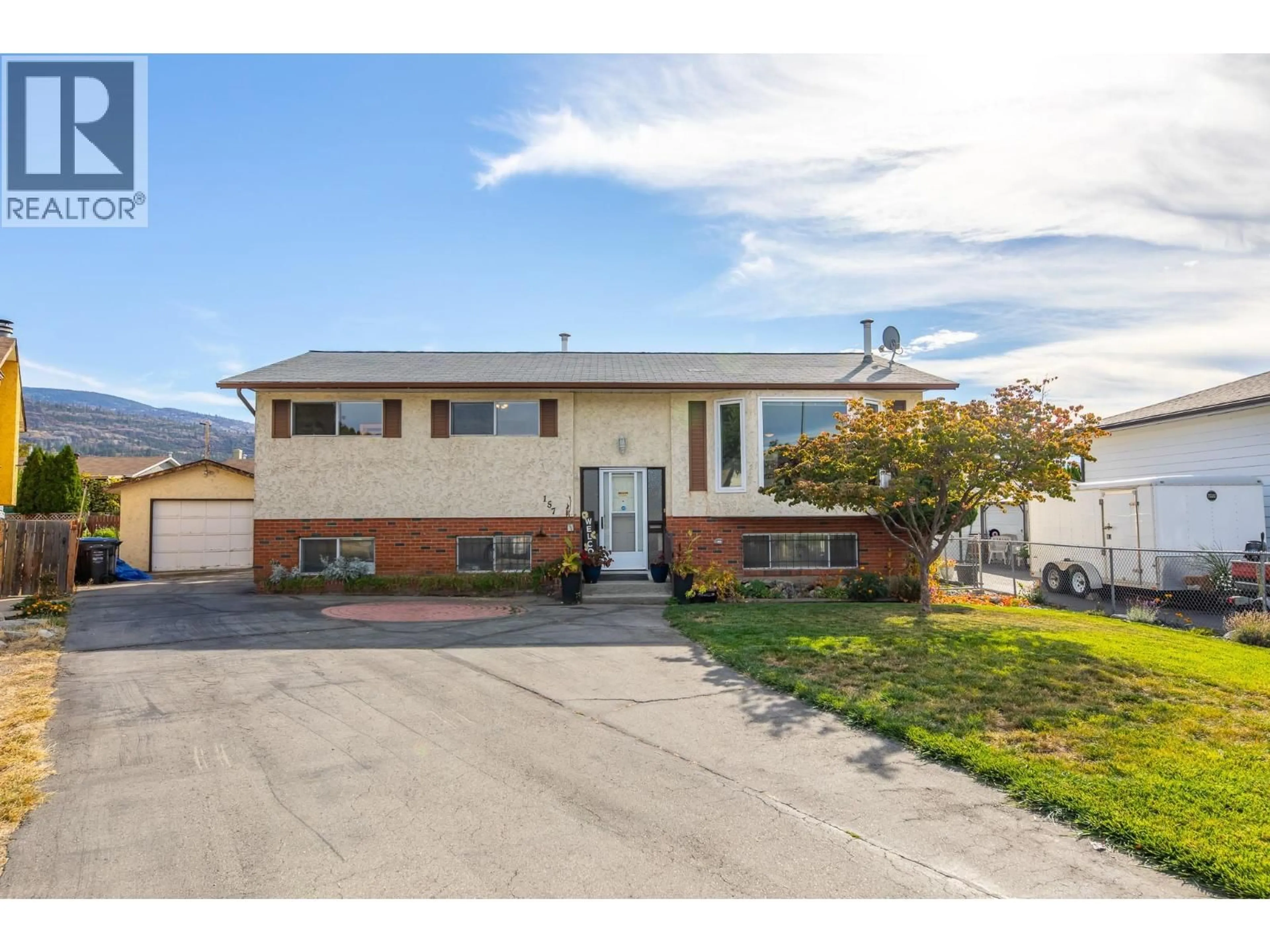 Home with vinyl exterior material, street for 157 MURRAY DRIVE, Penticton British Columbia V2A6W7