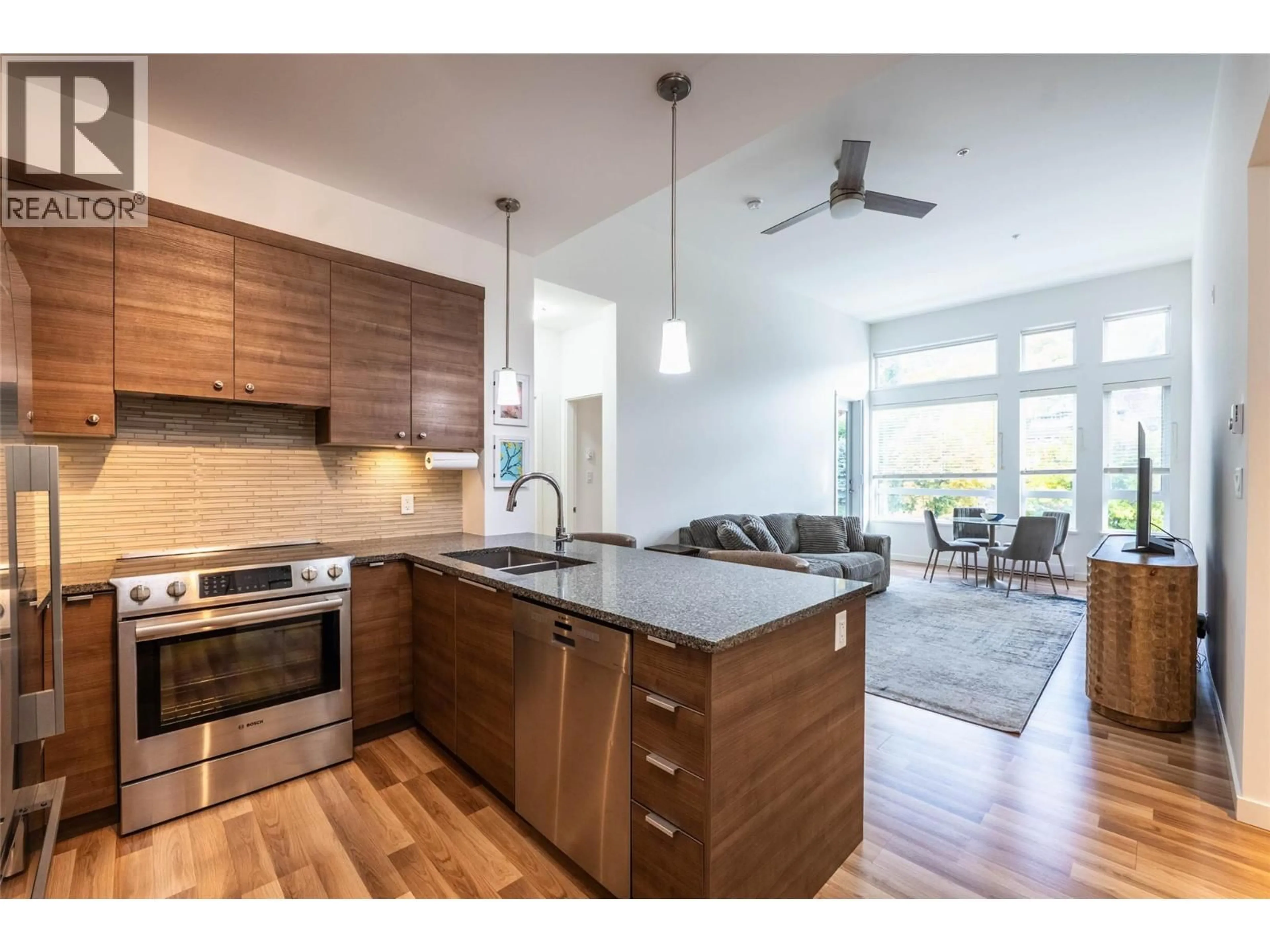 Open concept kitchen, wood/laminate floor for 407 - 710 VERNON STREET, Nelson British Columbia V1L4G2