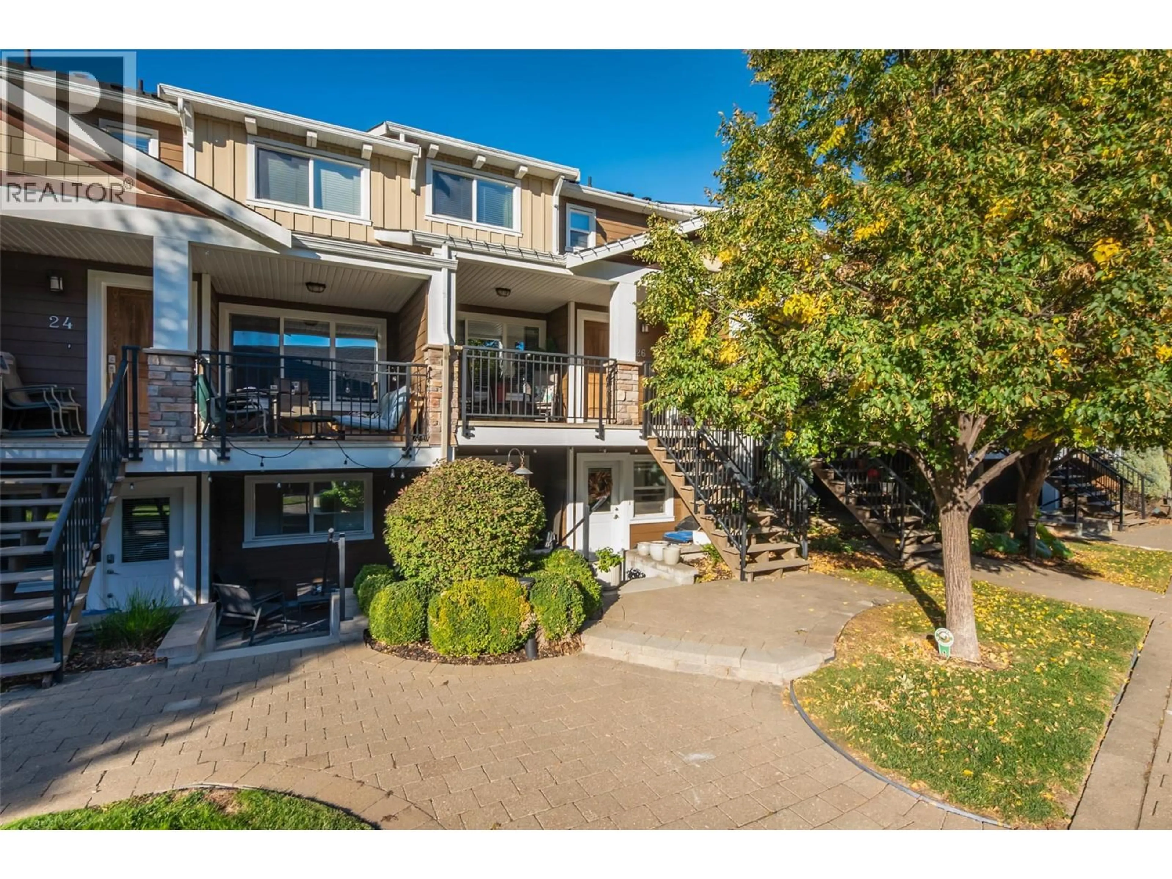 A pic from outside/outdoor area/front of a property/back of a property/a pic from drone, street for 26 - 600 BOYNTON PLACE, Kelowna British Columbia V1V3B8