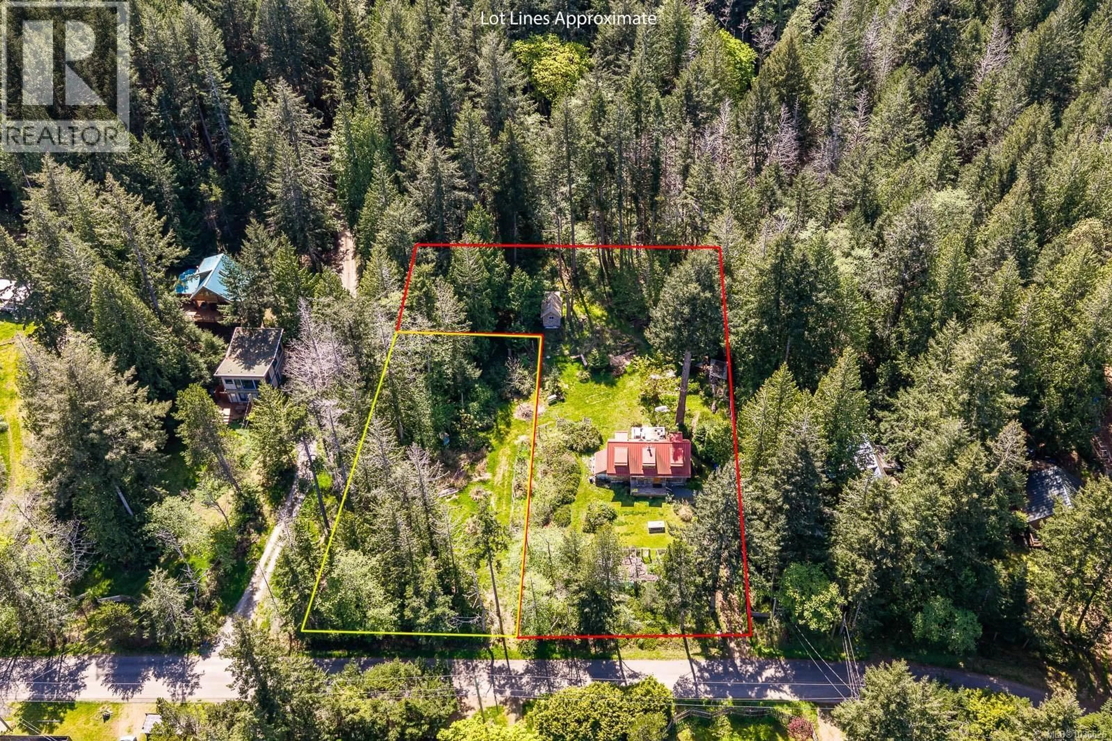 A pic from outside/outdoor area/front of a property/back of a property/a pic from drone, forest/trees view for 7670/7690 ANDERSON DRIVE, Hornby Island British Columbia V0R1Z0