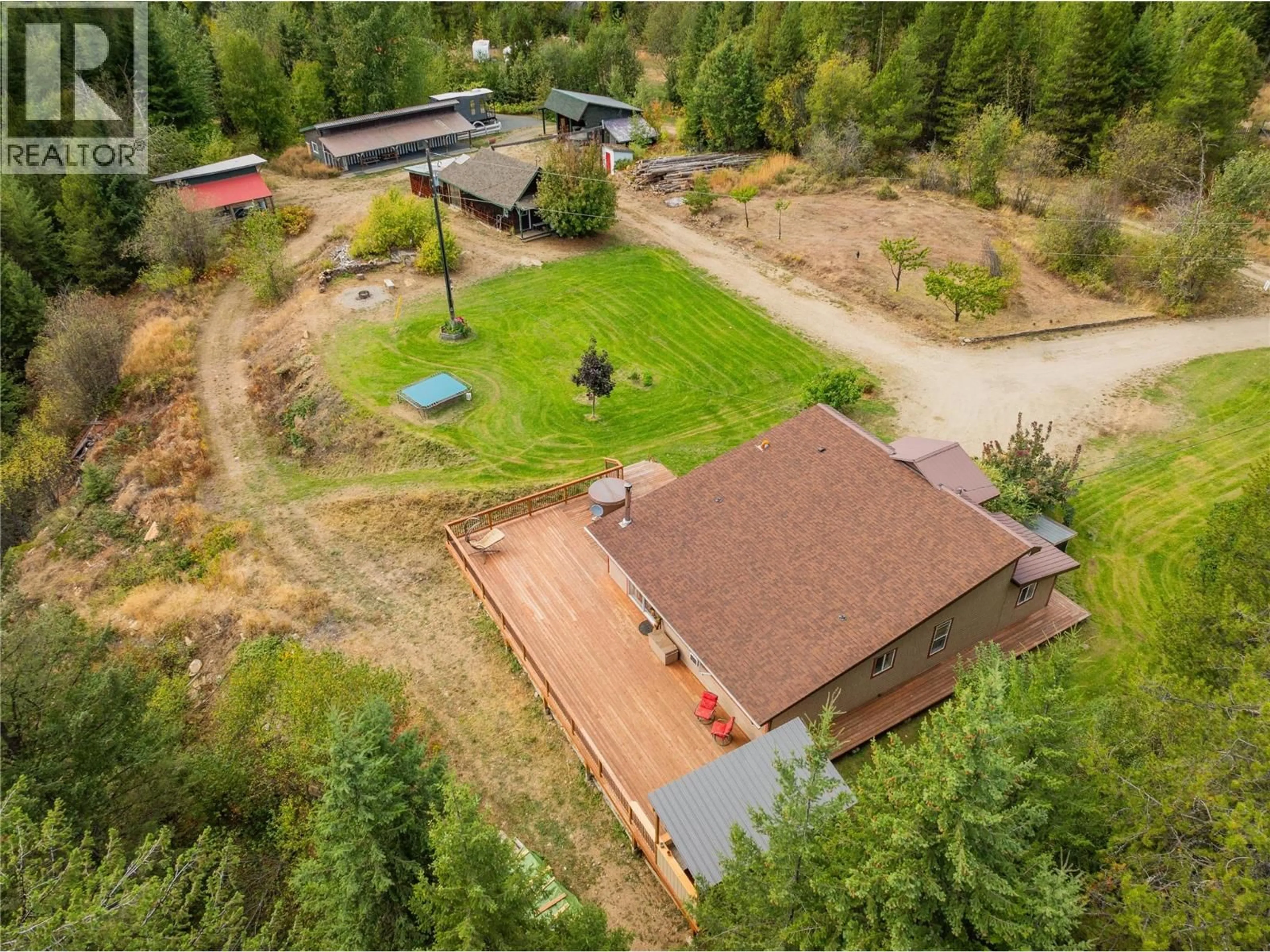 A pic from outside/outdoor area/front of a property/back of a property/a pic from drone, forest/trees view for 2396 NAULT ROAD, Castlegar British Columbia V1N4T5
