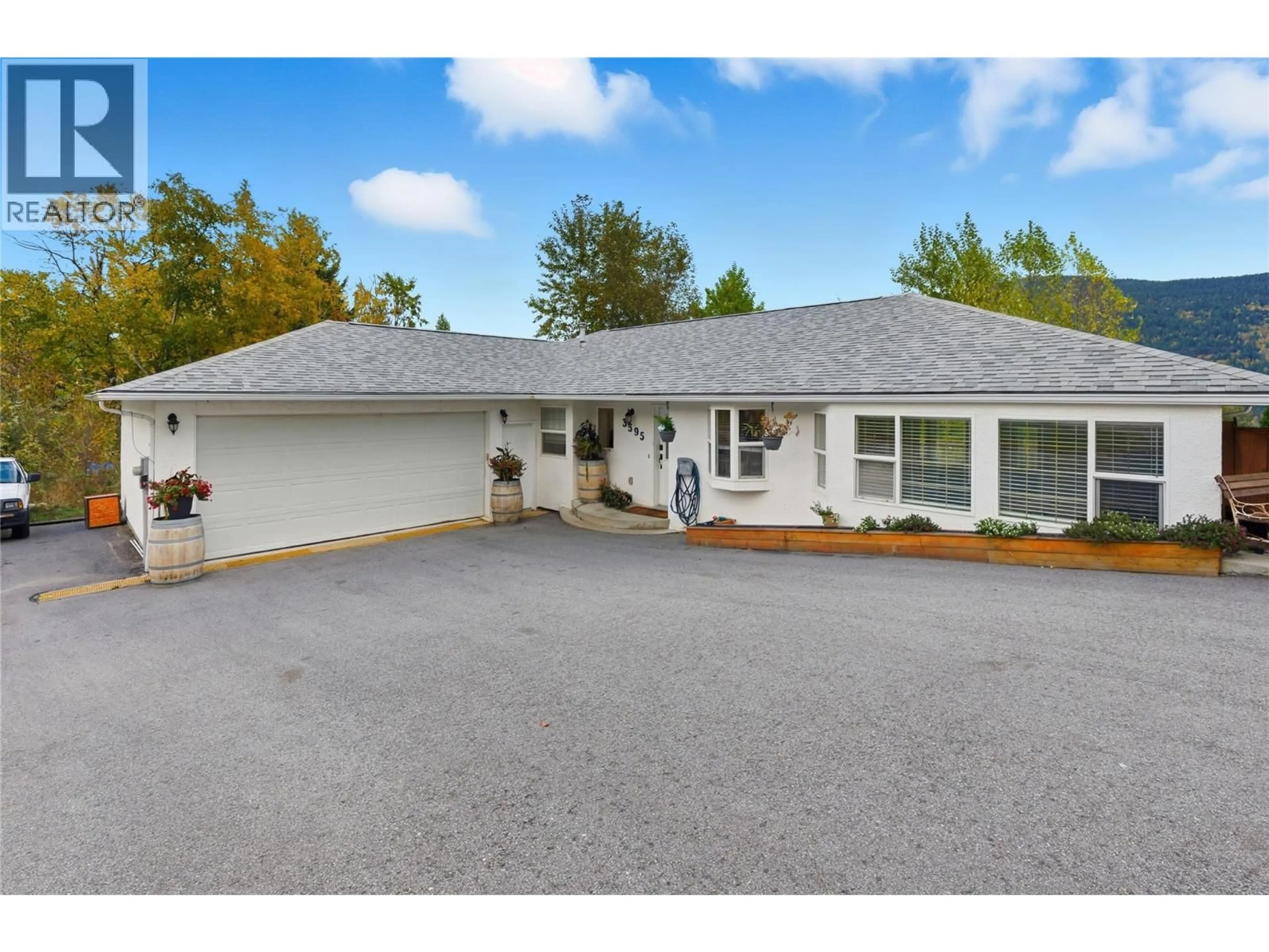 A pic from outside/outdoor area/front of a property/back of a property/a pic from drone, street for 3395 SOUTHRIDGE DRIVE, Castlegar British Columbia V1N4G1