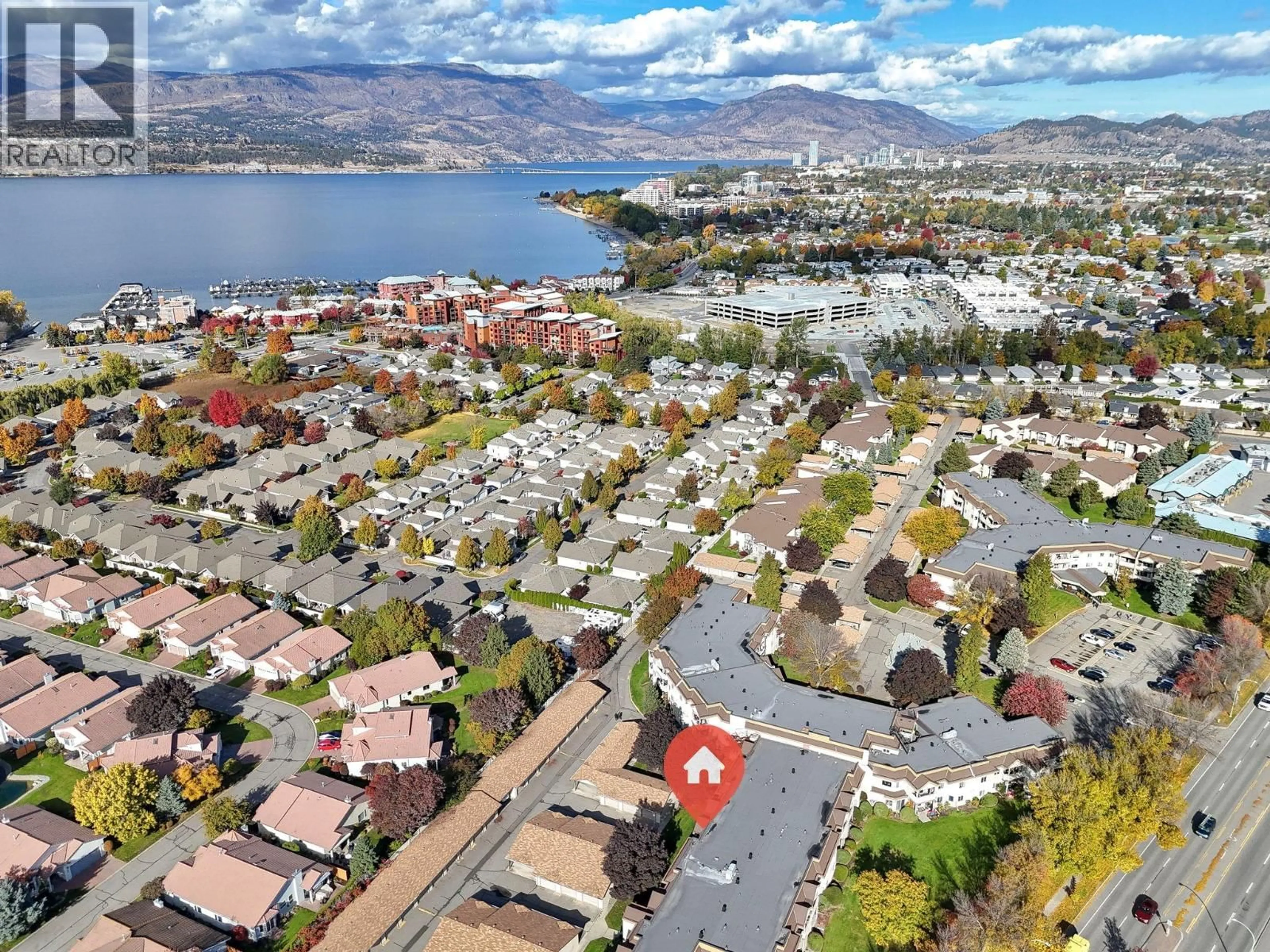 A pic from outside/outdoor area/front of a property/back of a property/a pic from drone, water/lake/river/ocean view for 174 - 3854 GORDON DRIVE, Kelowna British Columbia V1W5A3