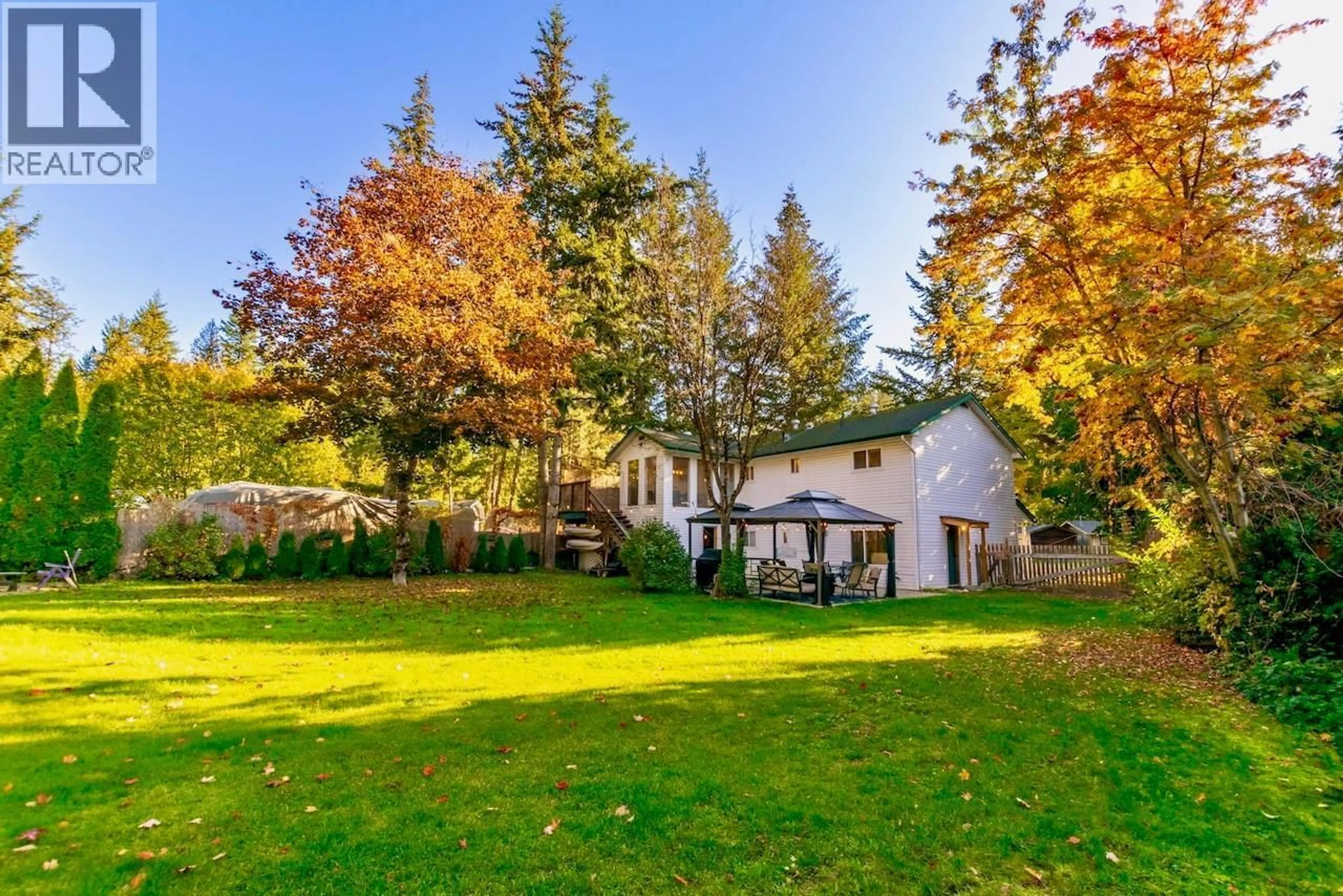 A pic from outside/outdoor area/front of a property/back of a property/a pic from drone, forest/trees view for 4179 ASHE CRESCENT, Scotch Creek British Columbia V0E1M5