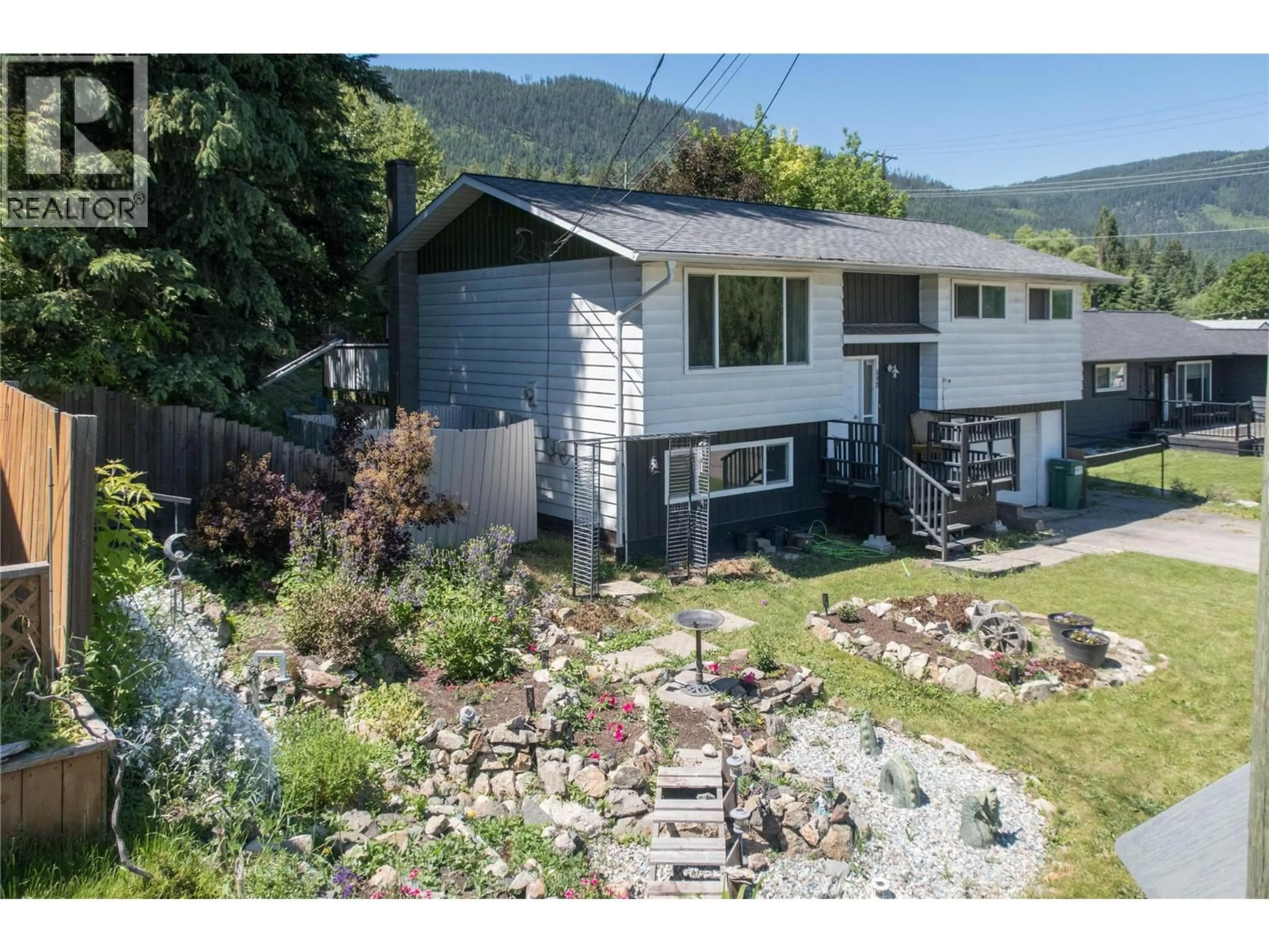 A pic from outside/outdoor area/front of a property/back of a property/a pic from drone, mountain view for 2284 PARK AVENUE, Lumby British Columbia V0E2G0
