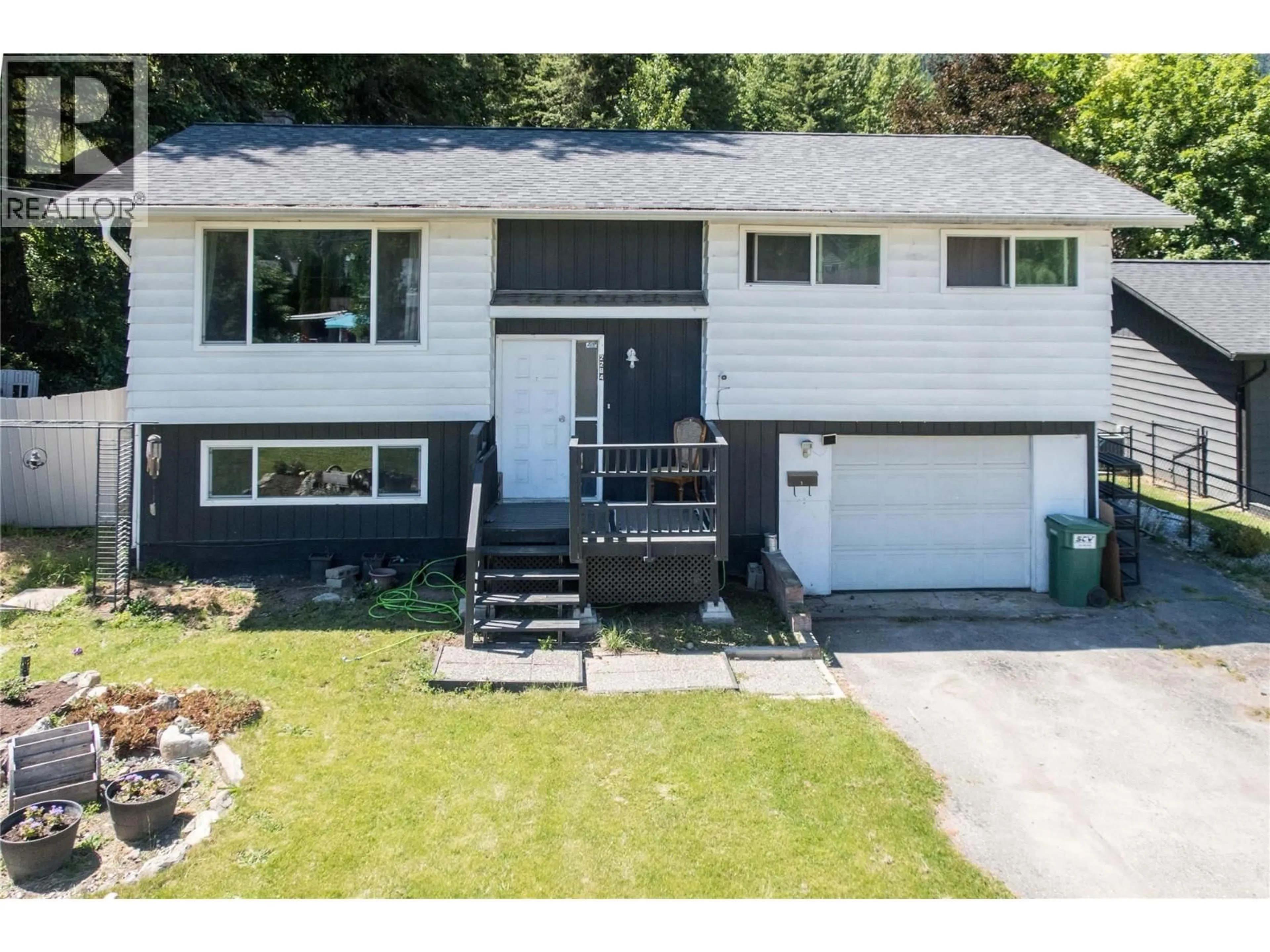 Home with vinyl exterior material, street for 2284 PARK AVENUE, Lumby British Columbia V0E2G0