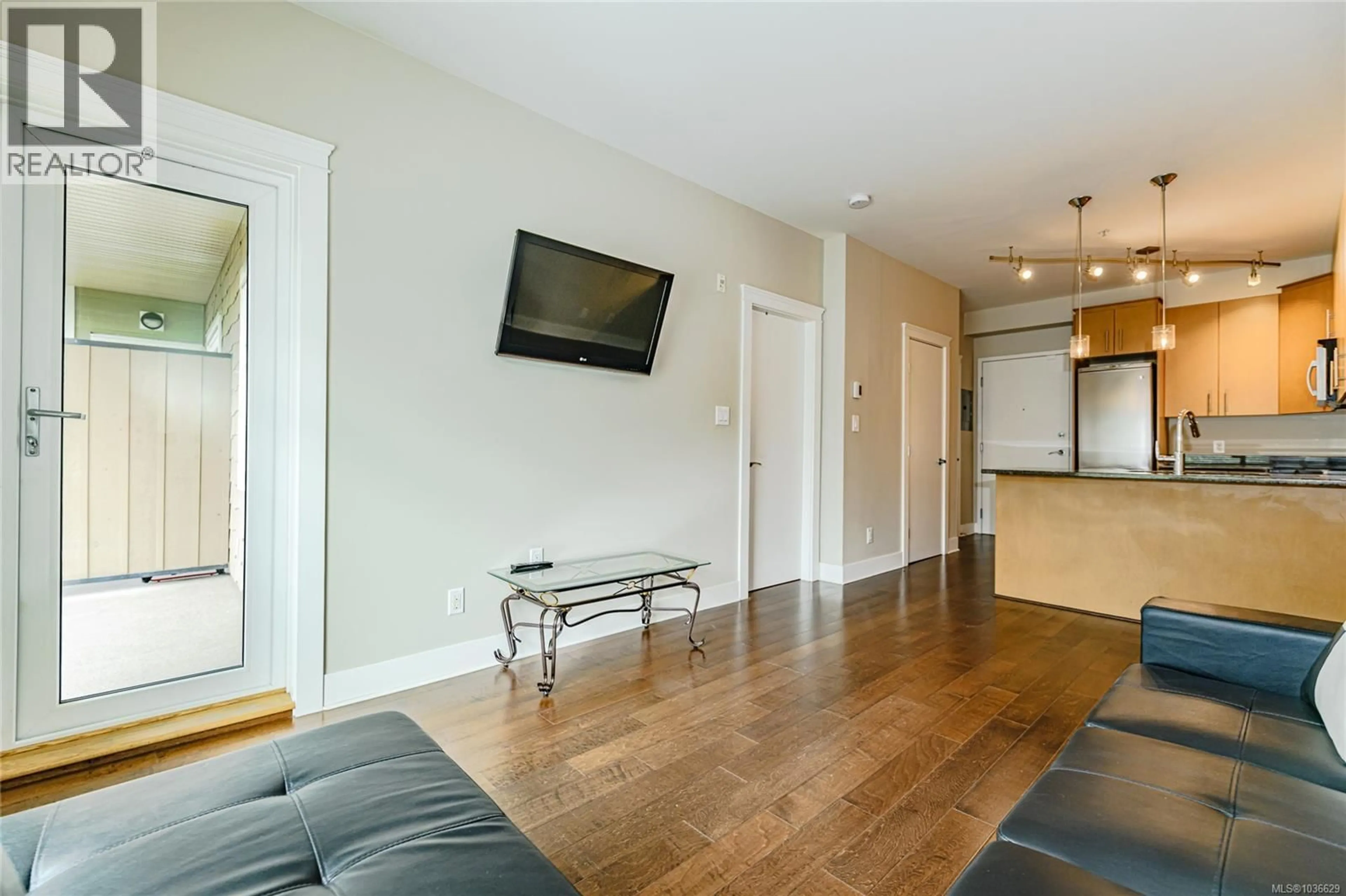 Living room with furniture, wood/laminate floor for 214 - 21 CONARD STREET, View Royal British Columbia V8Z0C4