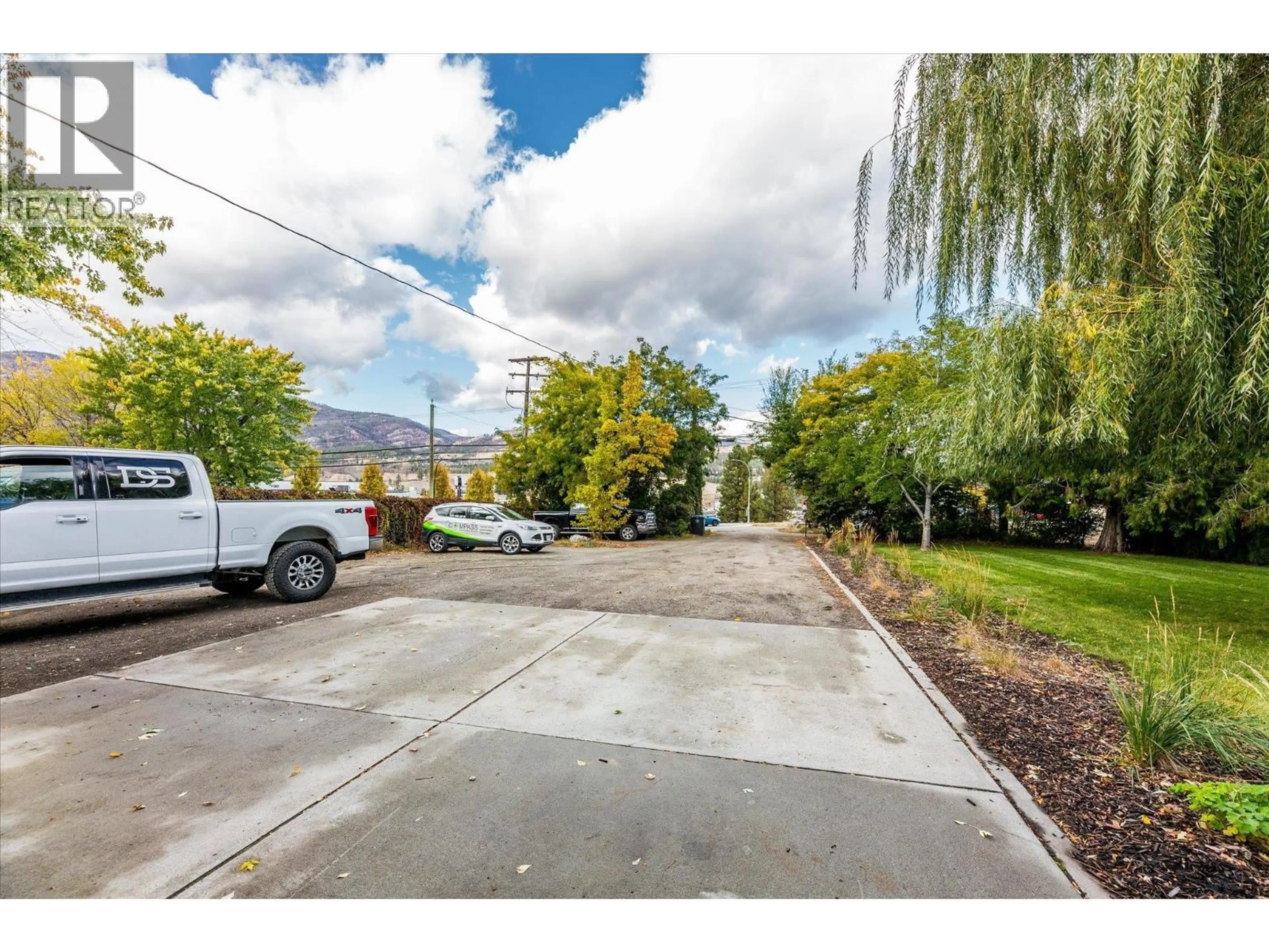 A pic from outside/outdoor area/front of a property/back of a property/a pic from drone, street for 1189 HUDSON ROAD, West Kelowna British Columbia V1Z1J2