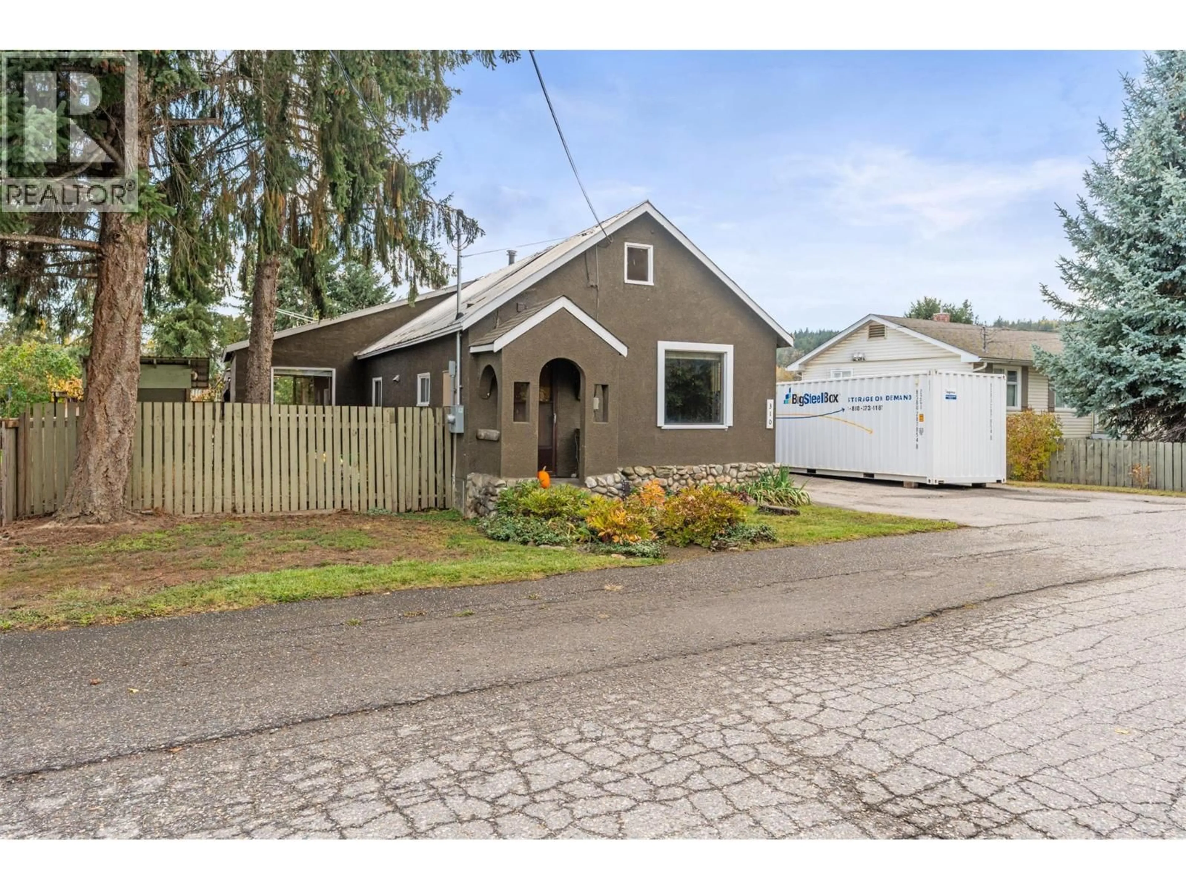 Home with vinyl exterior material, street for 310 BAIRD AVENUE, Enderby British Columbia V4Y4A2