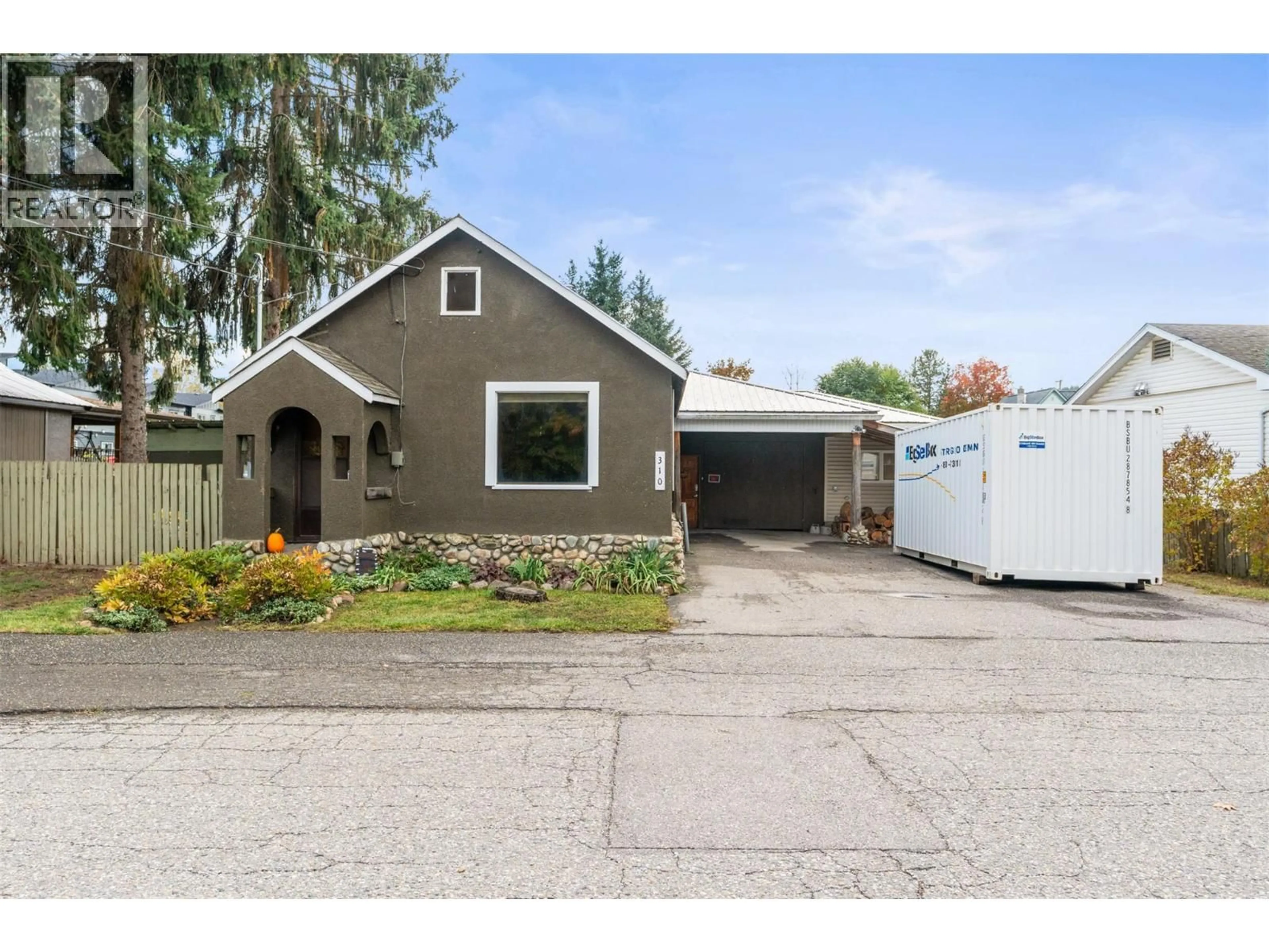 Home with vinyl exterior material, street for 310 BAIRD AVENUE, Enderby British Columbia V4Y4A2