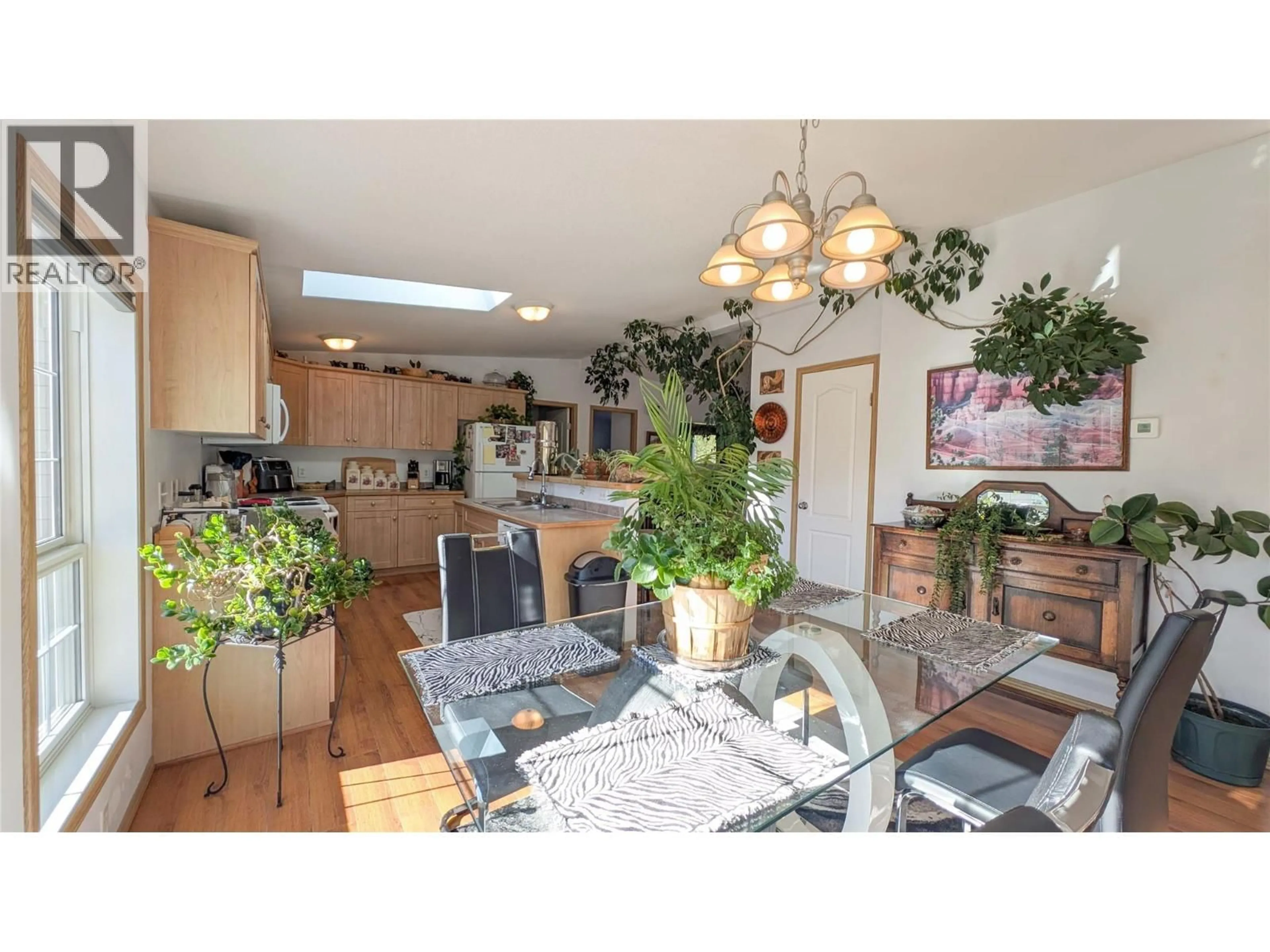 Dining room, wood/laminate floor for 2101 MAWER ROAD, Kimberley British Columbia V1A3L9