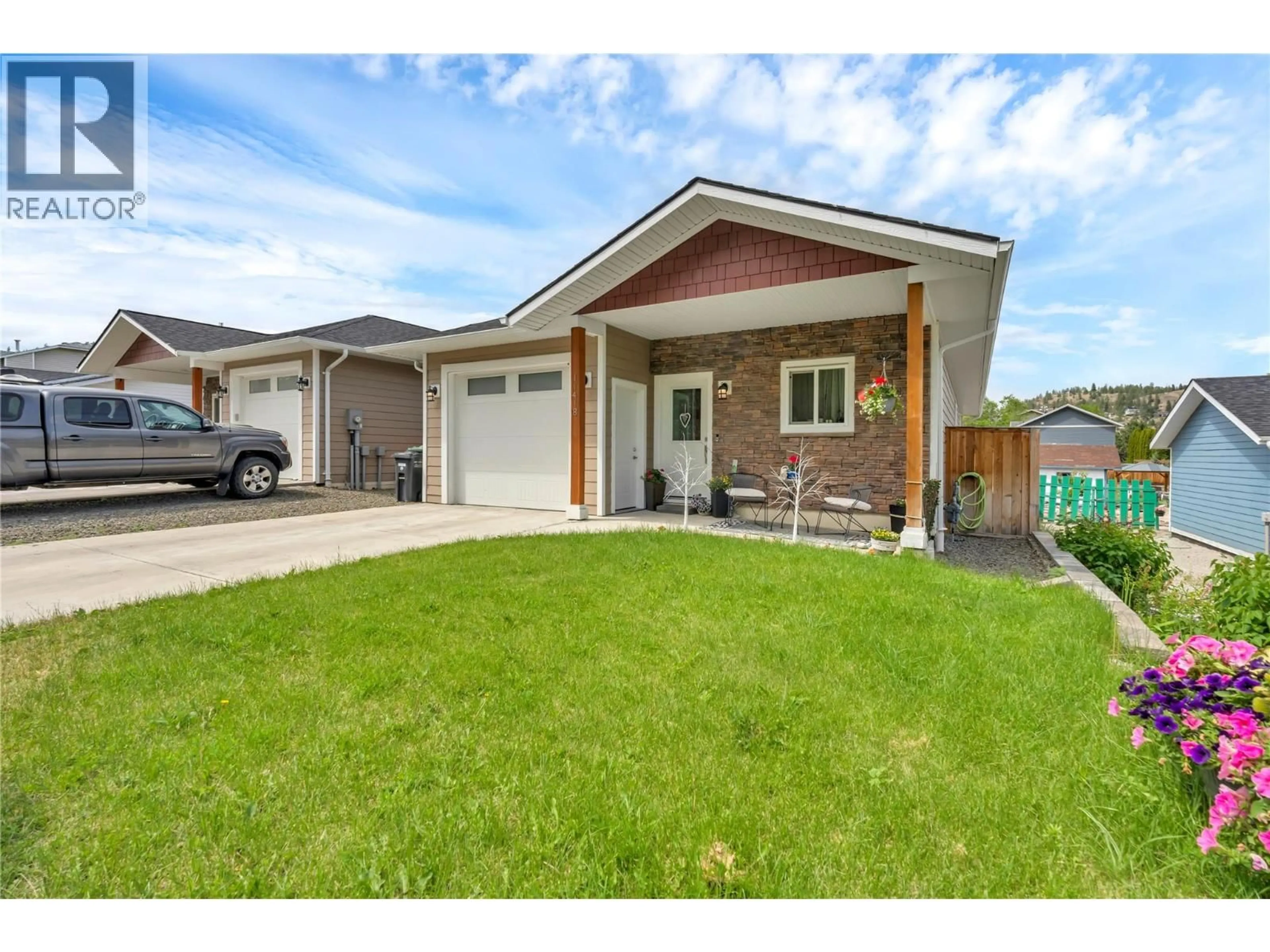 Home with vinyl exterior material, street for 11418 ADAMS AVENUE, Summerland British Columbia V0H1Z2
