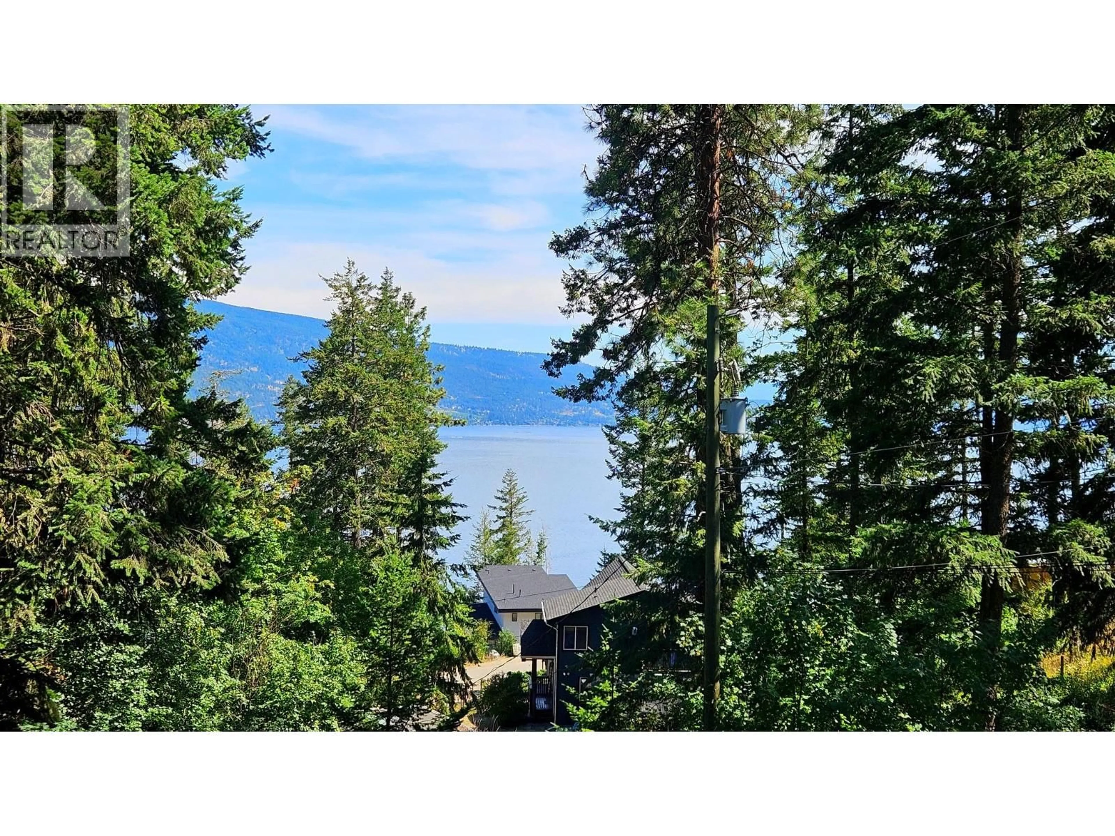A pic from outside/outdoor area/front of a property/back of a property/a pic from drone, water/lake/river/ocean view for 405 KILDARE WAY, Vernon British Columbia V1T2C7