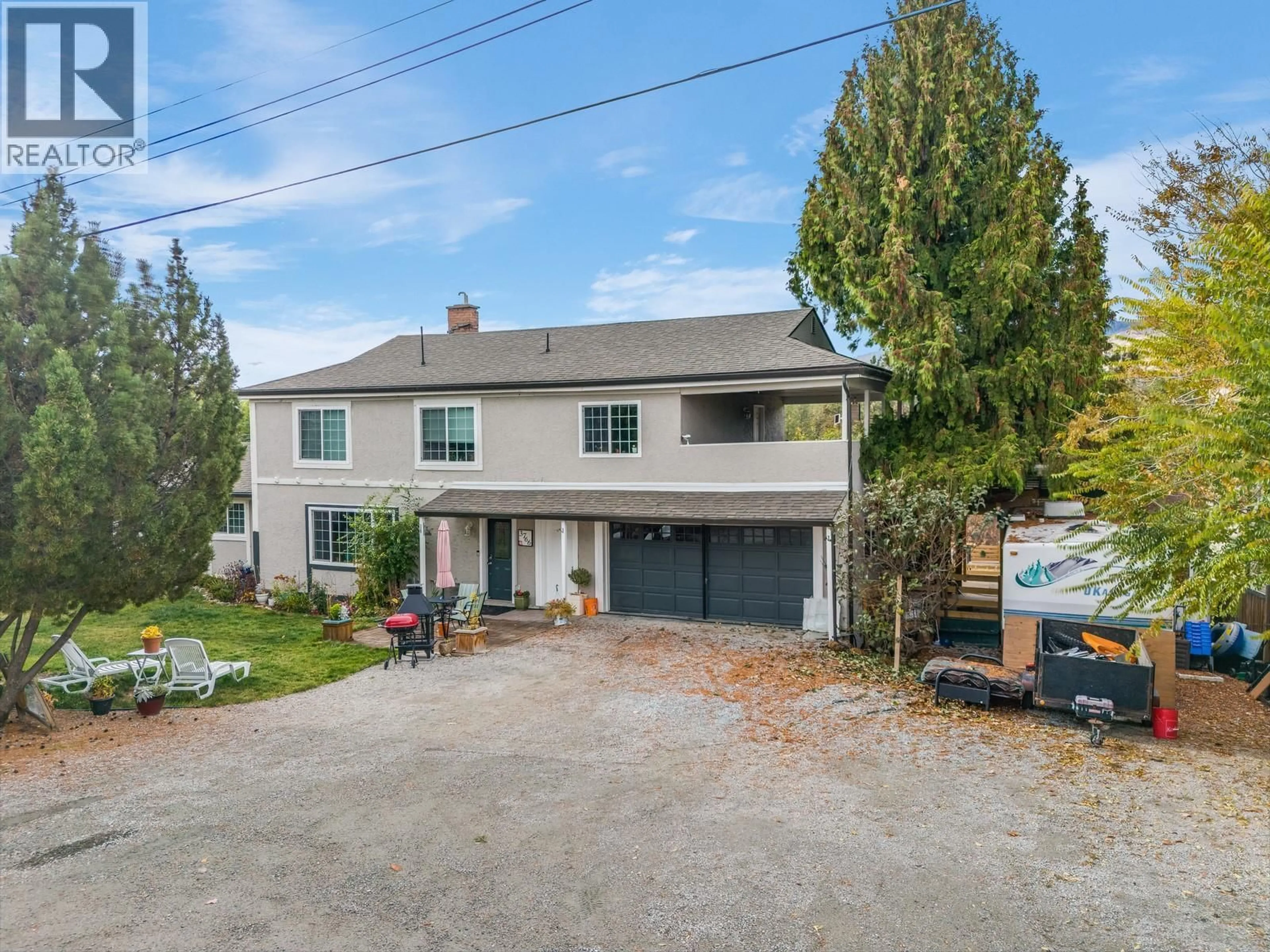 A pic from outside/outdoor area/front of a property/back of a property/a pic from drone, street for 3766 WETTON ROAD, West Kelowna British Columbia V4T2C1