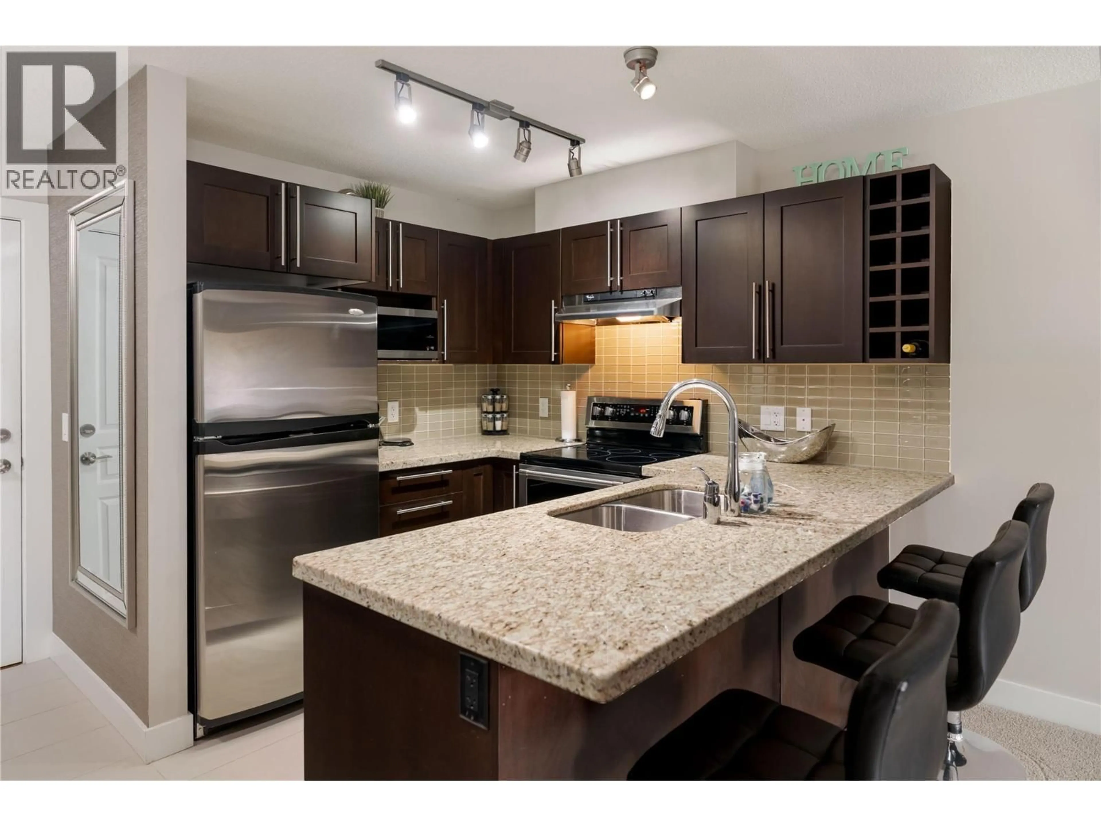 Standard kitchen, ceramic/tile floor for 312 - 1083 SUNSET DRIVE, Kelowna British Columbia V1Y9Z1