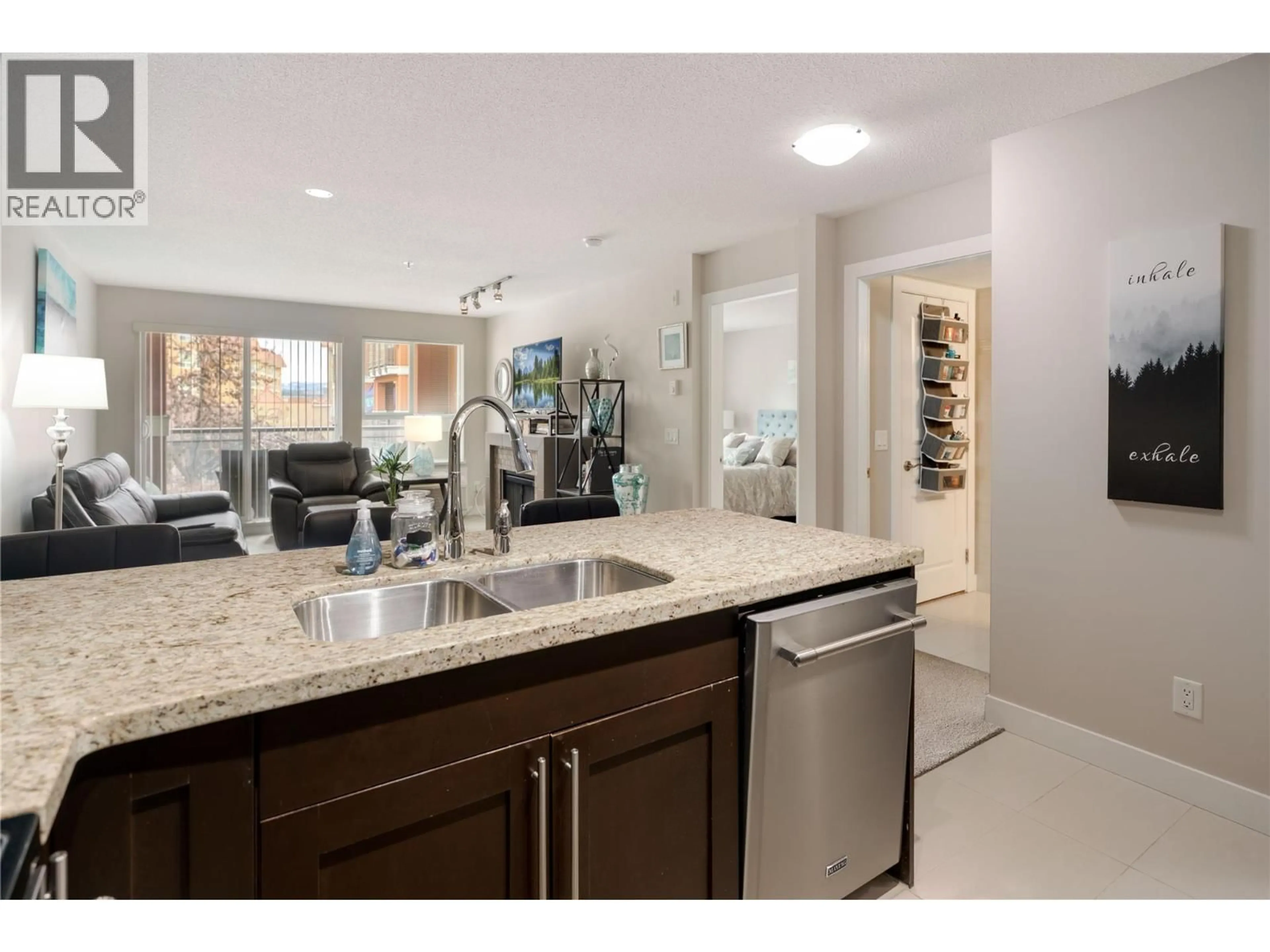 Open concept kitchen, ceramic/tile floor for 312 - 1083 SUNSET DRIVE, Kelowna British Columbia V1Y9Z1